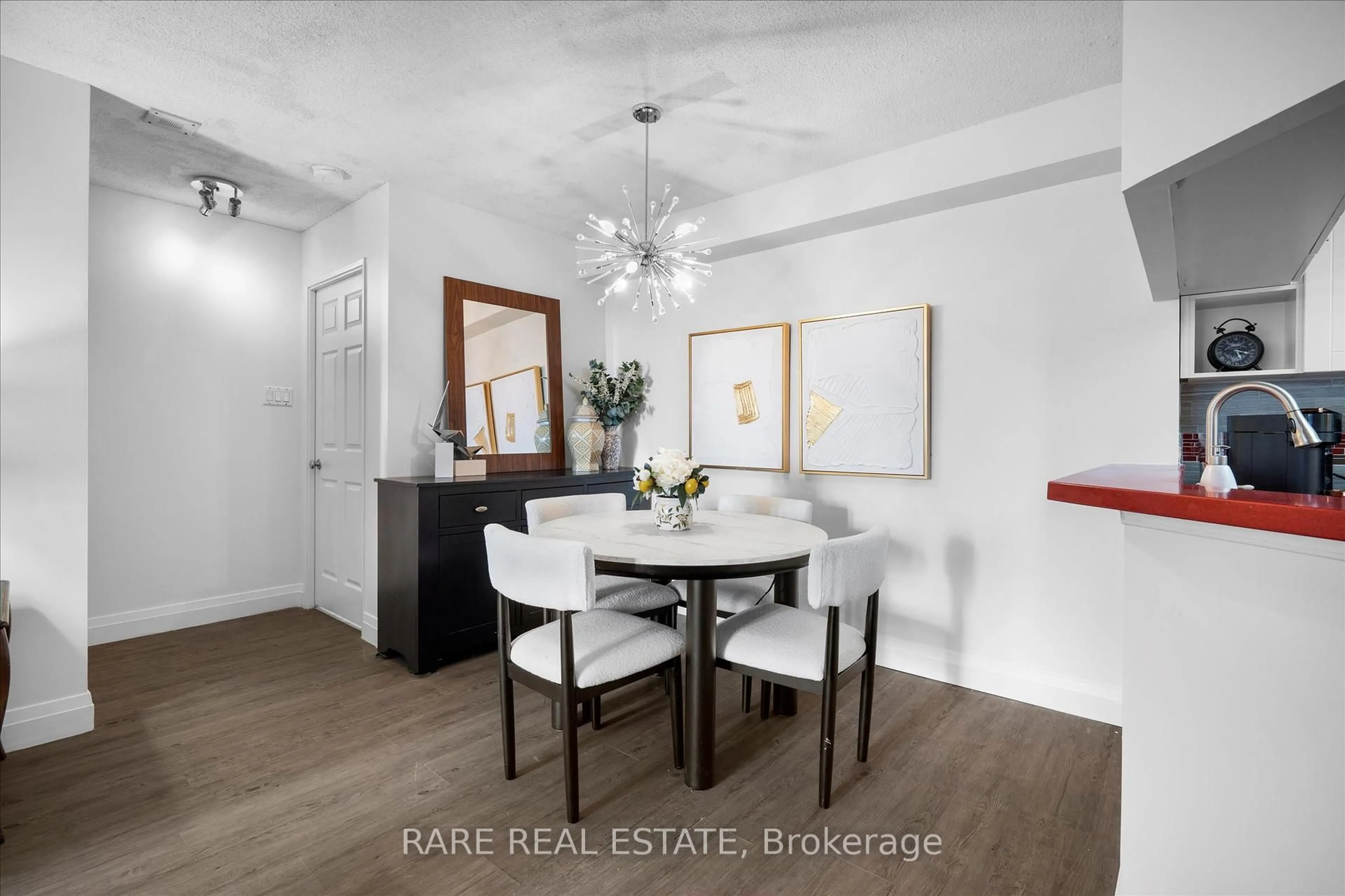 Dining room, wood/laminate floor for 250 Webb Dr #513, Mississauga Ontario L5B 3Z4