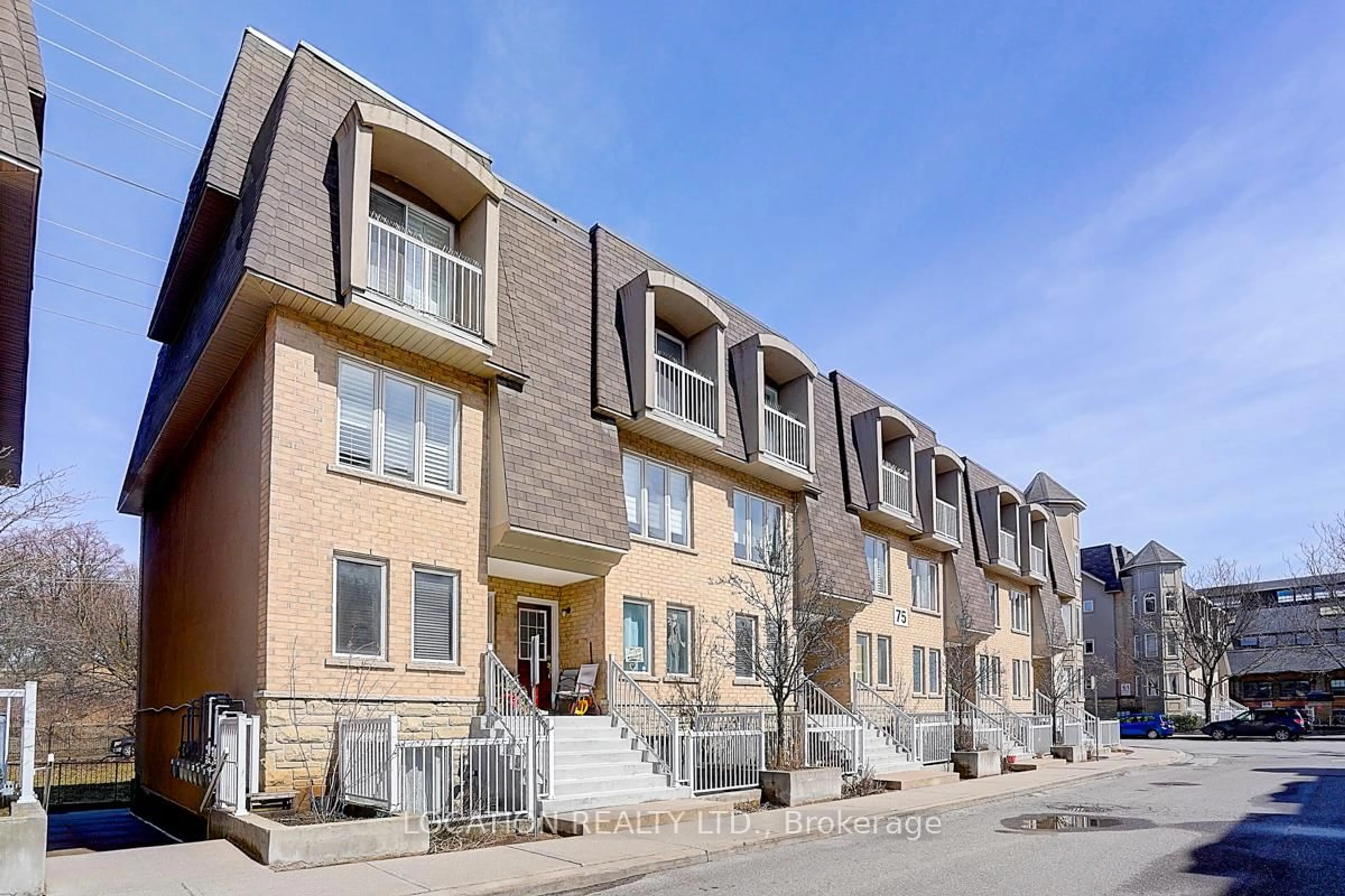 Home with brick exterior material, street for 75 Turntable Cres #124, Toronto Ontario M6H 4K9