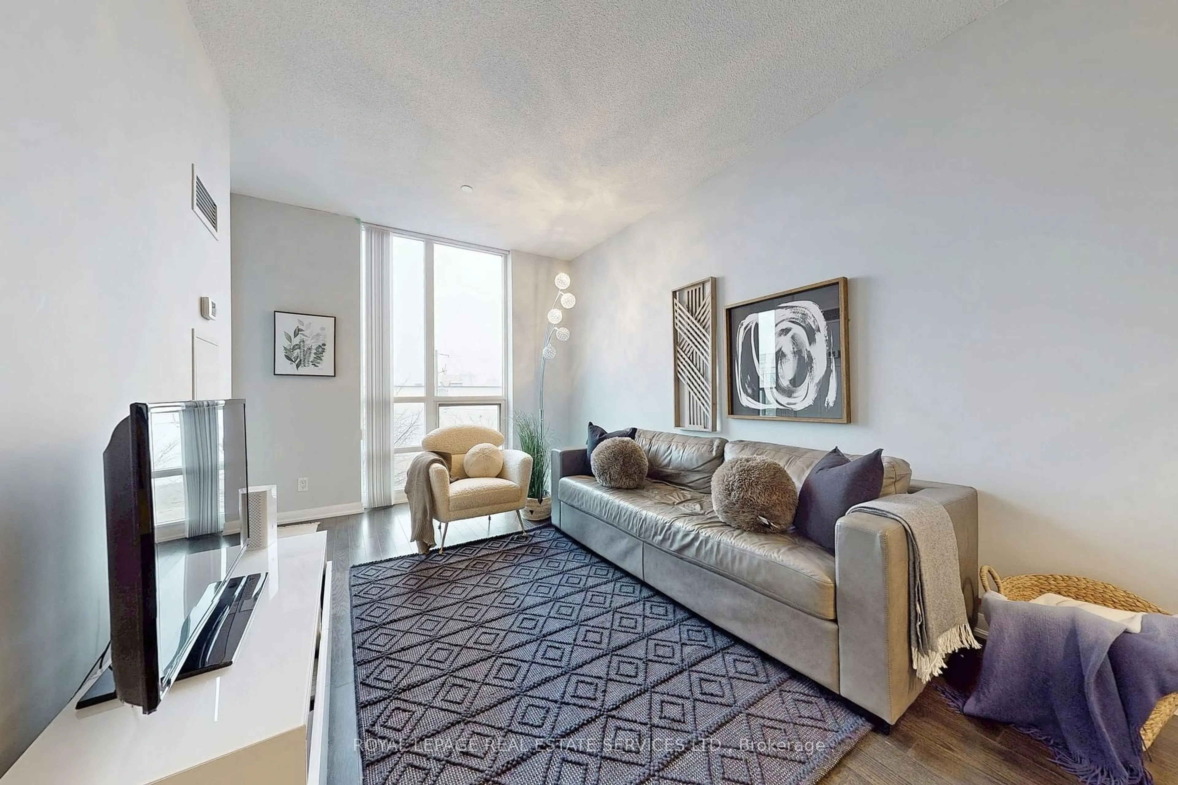Living room with furniture, unknown for 205 Sherway Gardens Rd #311, Toronto Ontario M9C 0A5