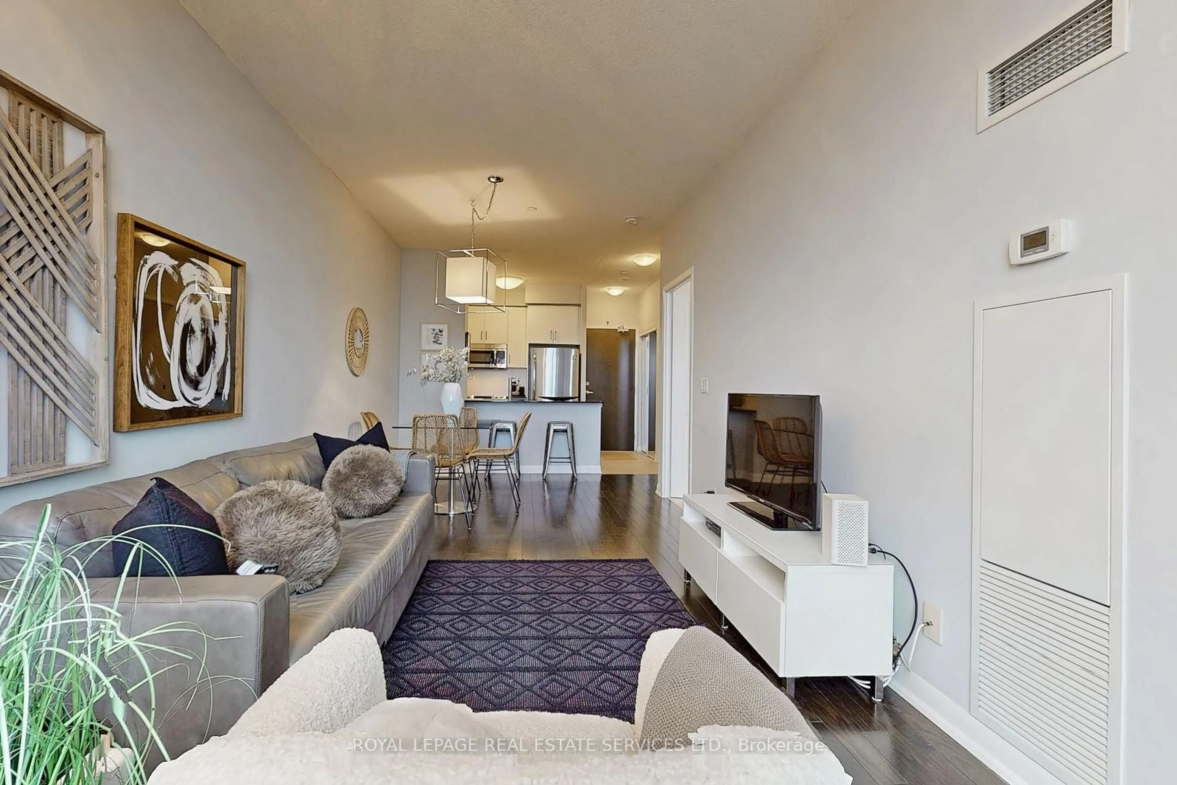 Living room with furniture, unknown for 205 Sherway Gardens Rd #311, Toronto Ontario M9C 0A5