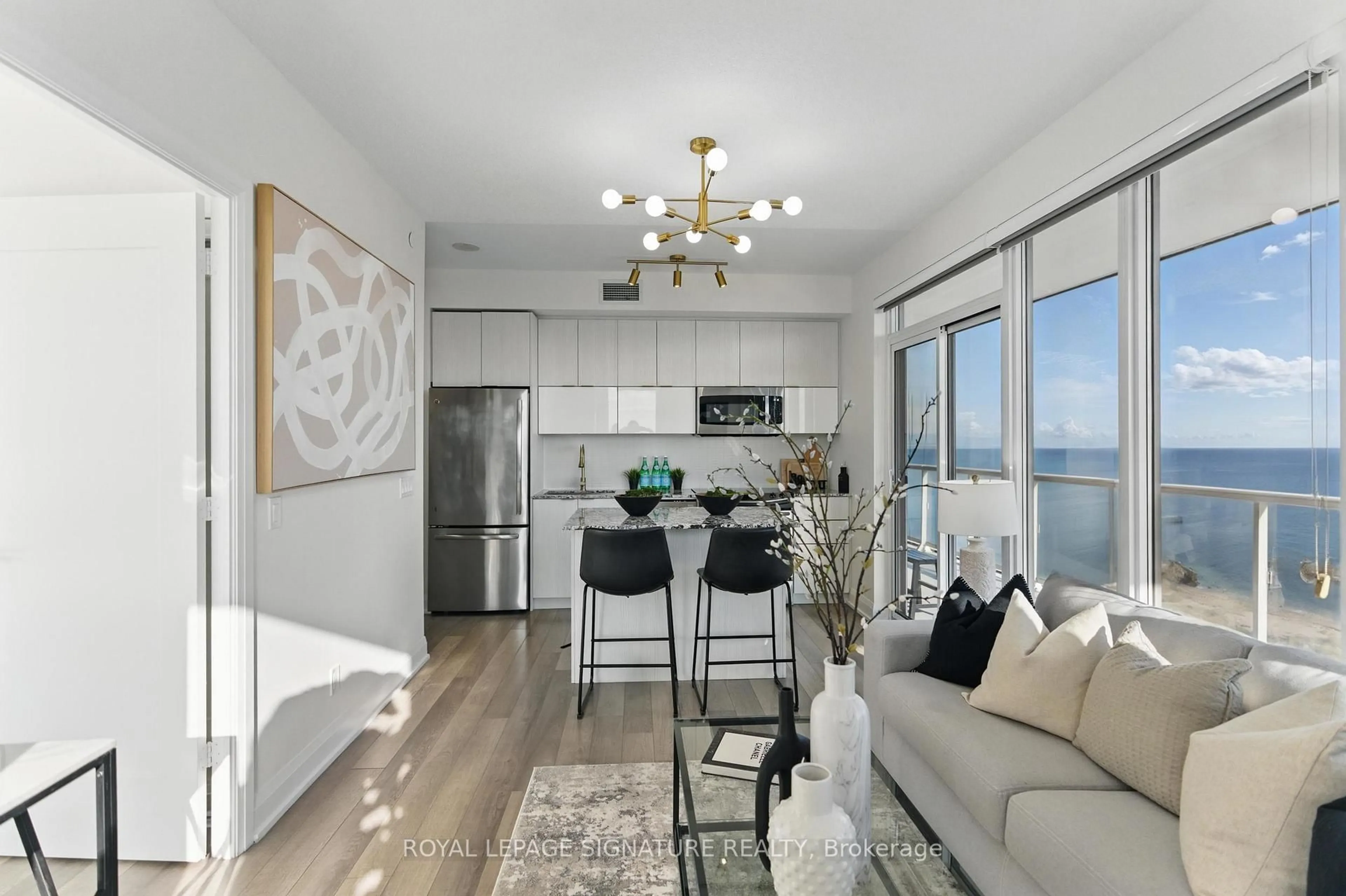 Open concept kitchen, wood/laminate floor for 56 Annie Craig Dr #4104, Toronto Ontario M8V 0C5