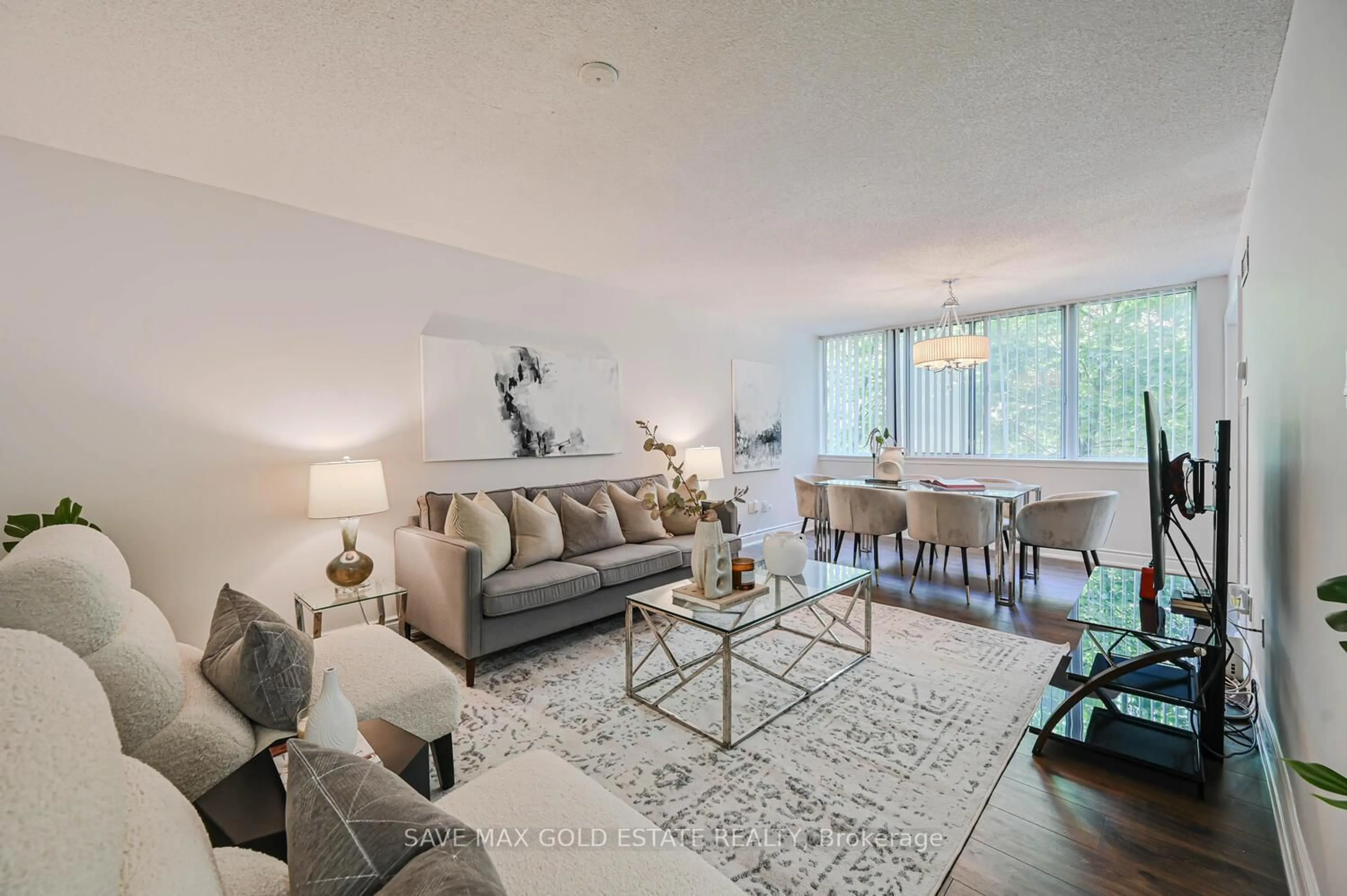Living room with furniture, unknown for 350 Webb Dr #209, Mississauga Ontario L5B 3W4