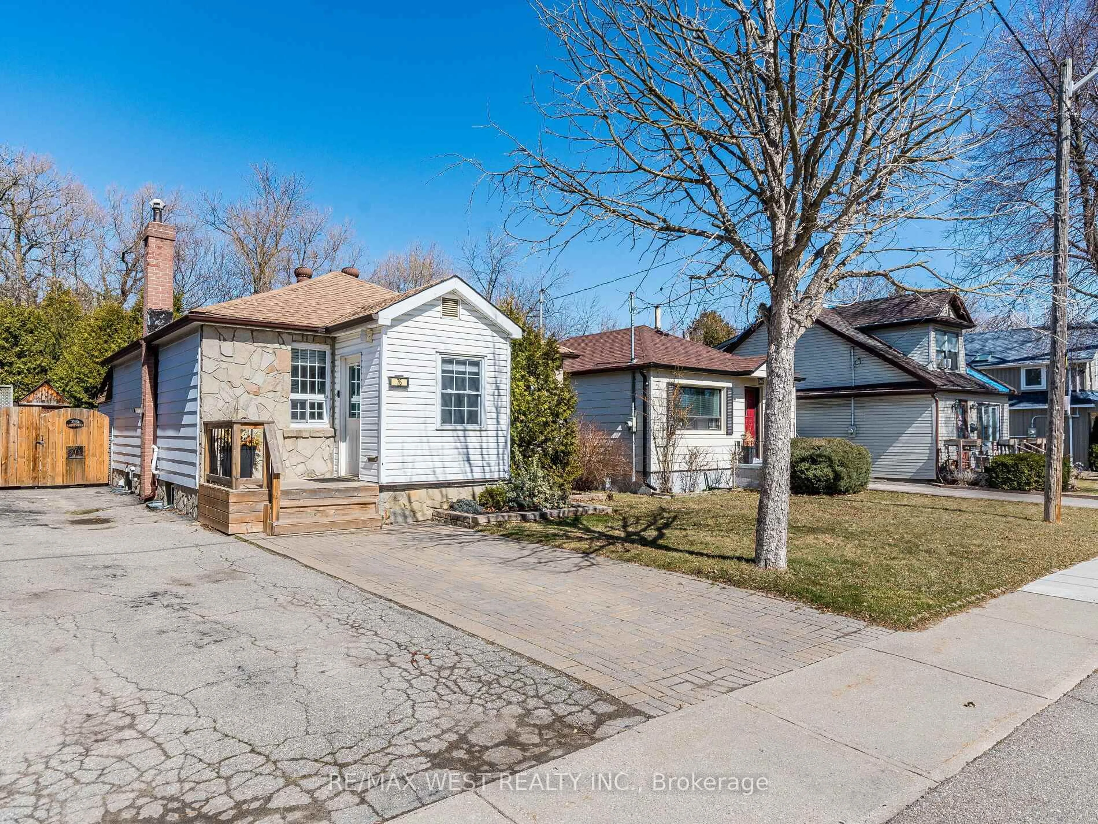 Home with brick exterior material, street for 76 Laburnham Ave, Toronto Ontario M8W 1S8