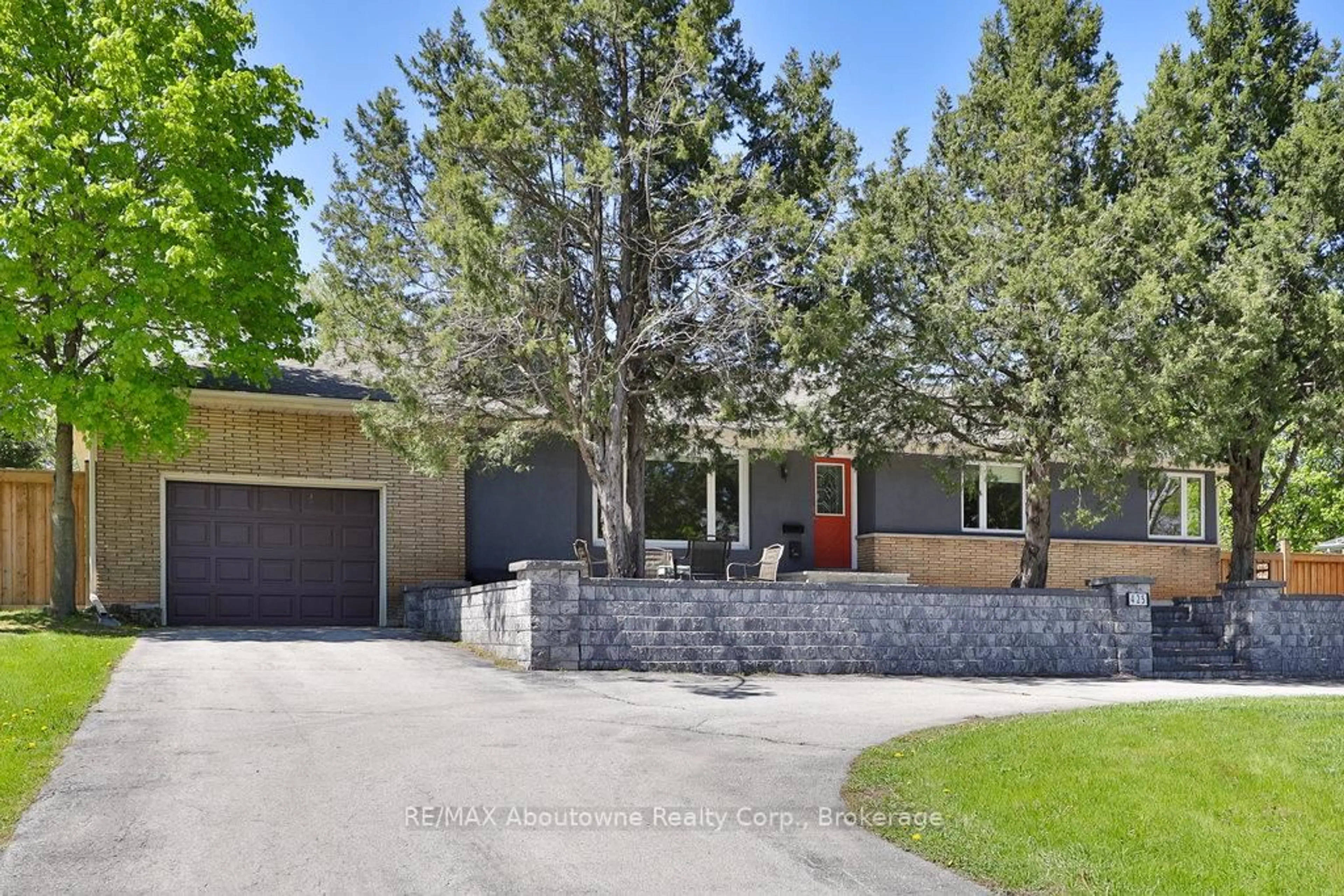 Home with brick exterior material, street for 425 Plains Rd, Burlington Ontario L7T 1G7