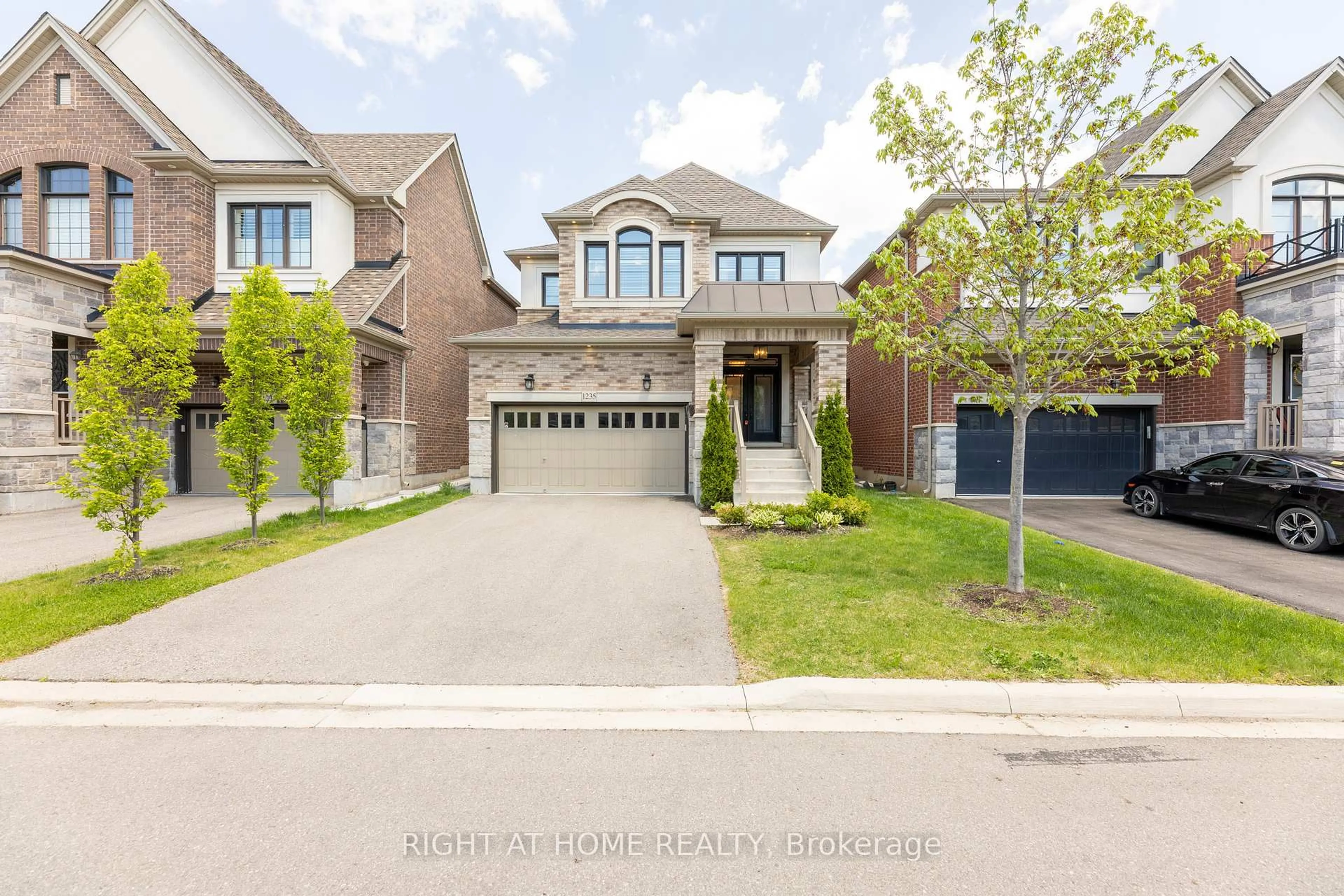 Home with brick exterior material, street for 1235 Mcphedran Pt, Milton Ontario L9E 1J8