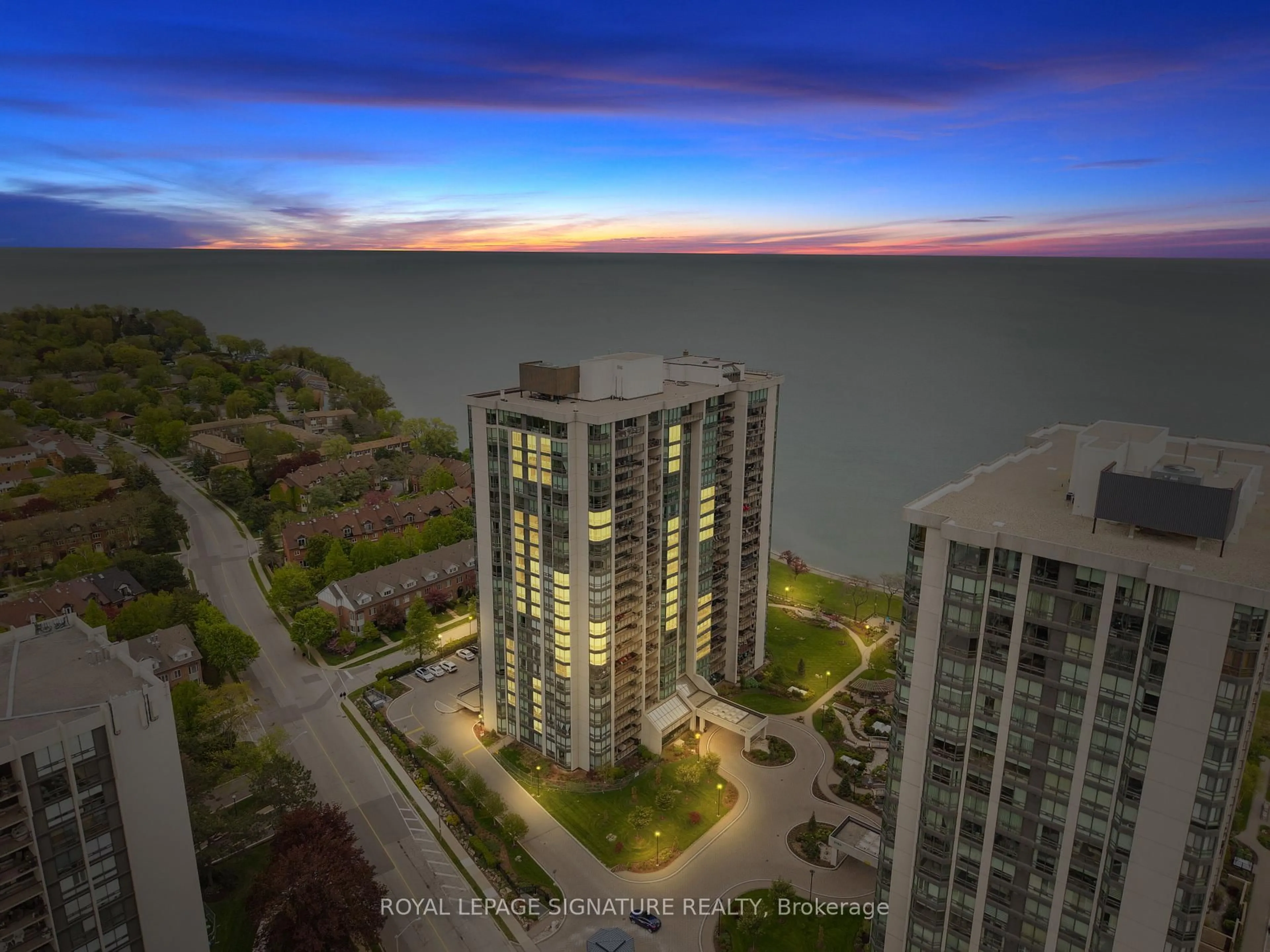 A pic from outside/outdoor area/front of a property/back of a property/a pic from drone, water/lake/river/ocean view for 2170 Marine Dr #307, Oakville Ontario L6L 5V1