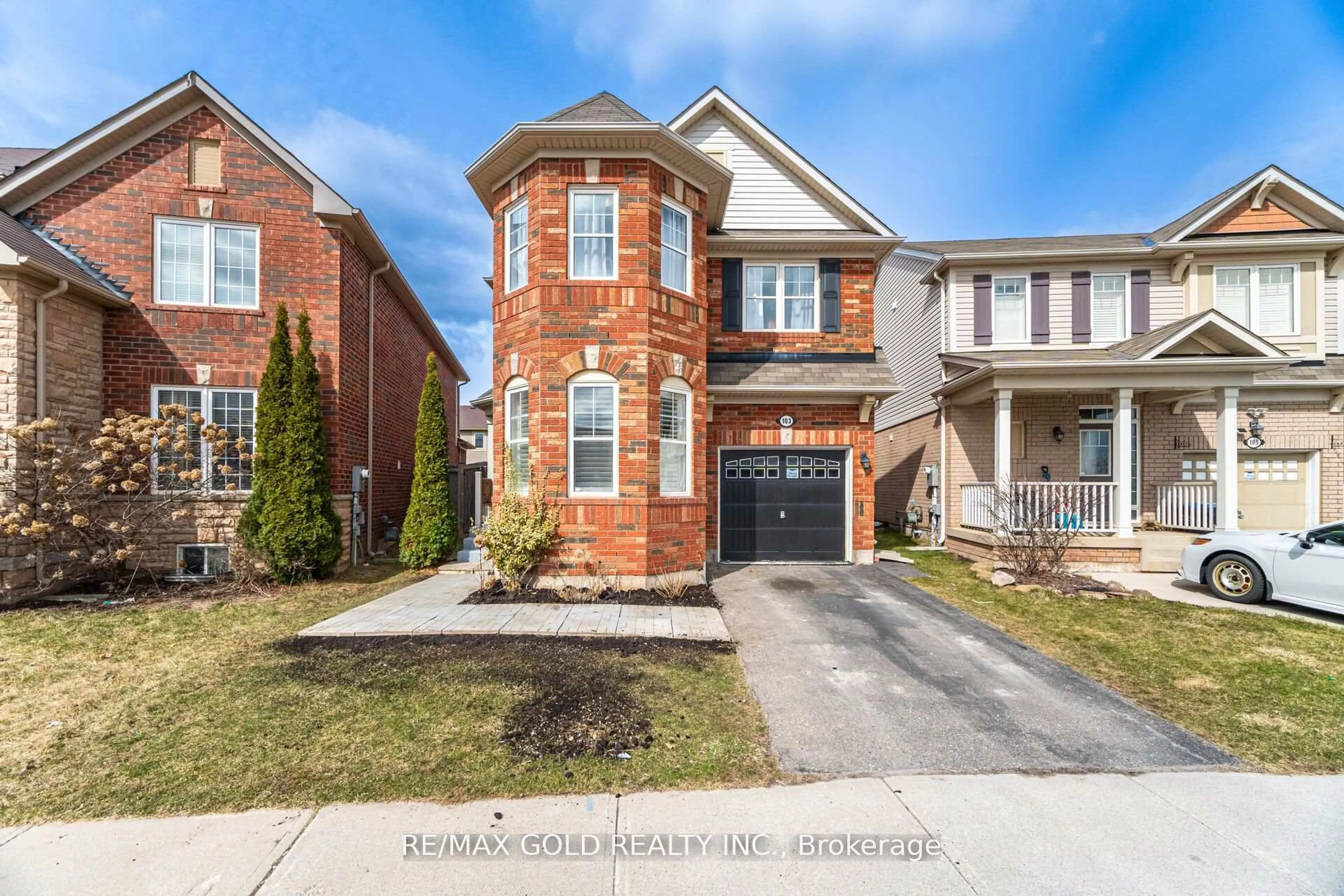 Home with brick exterior material, street for 103 Commuter Dr, Brampton Ontario L7A 0P7