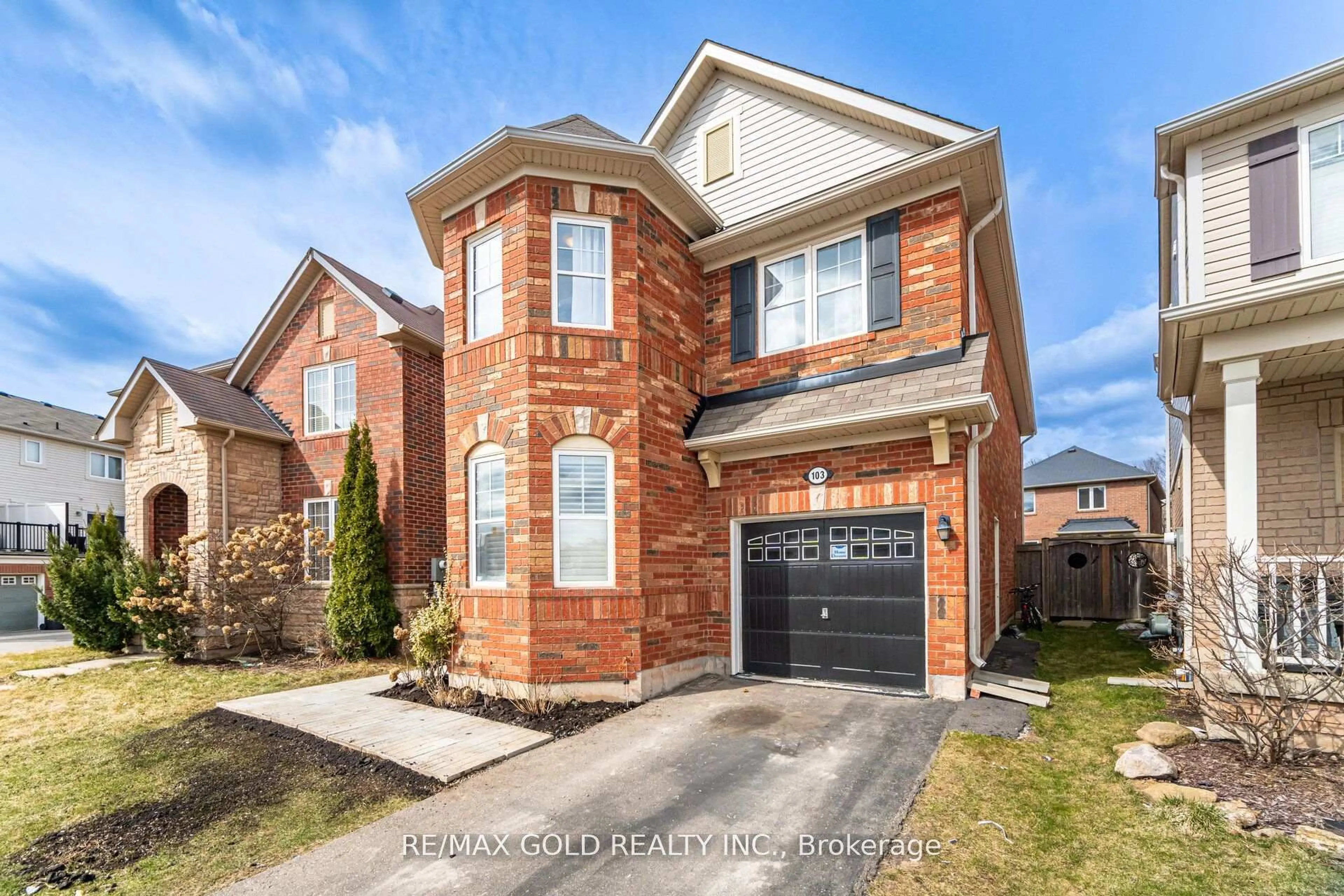 Home with brick exterior material, street for 103 Commuter Dr, Brampton Ontario L7A 0P7