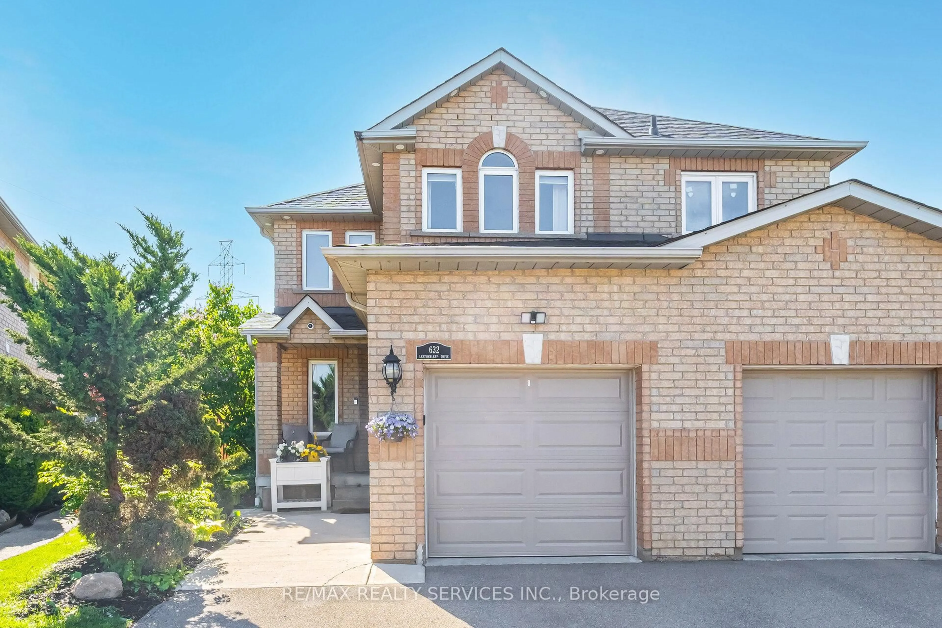 Home with brick exterior material, street for 632 Leatherleaf Dr, Mississauga Ontario L4Z 3Z1