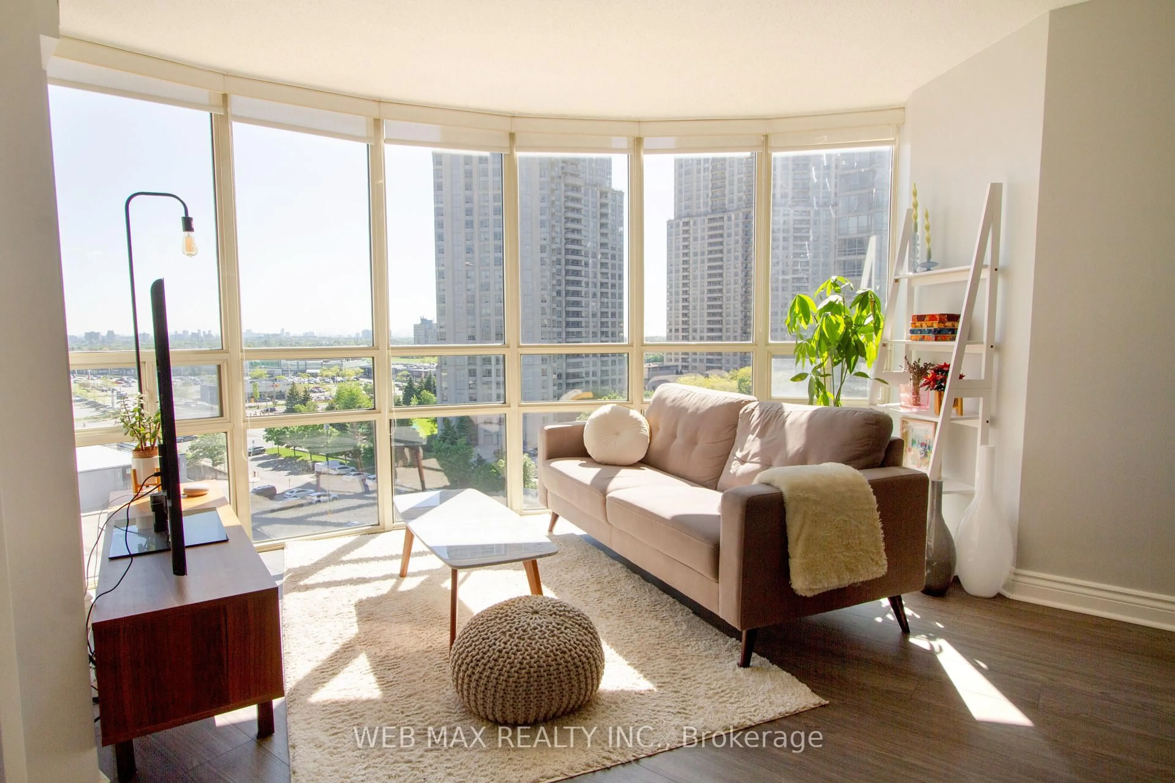 Living room with furniture, unknown for 50 Eglinton Ave #905, Mississauga Ontario L5R 3P5