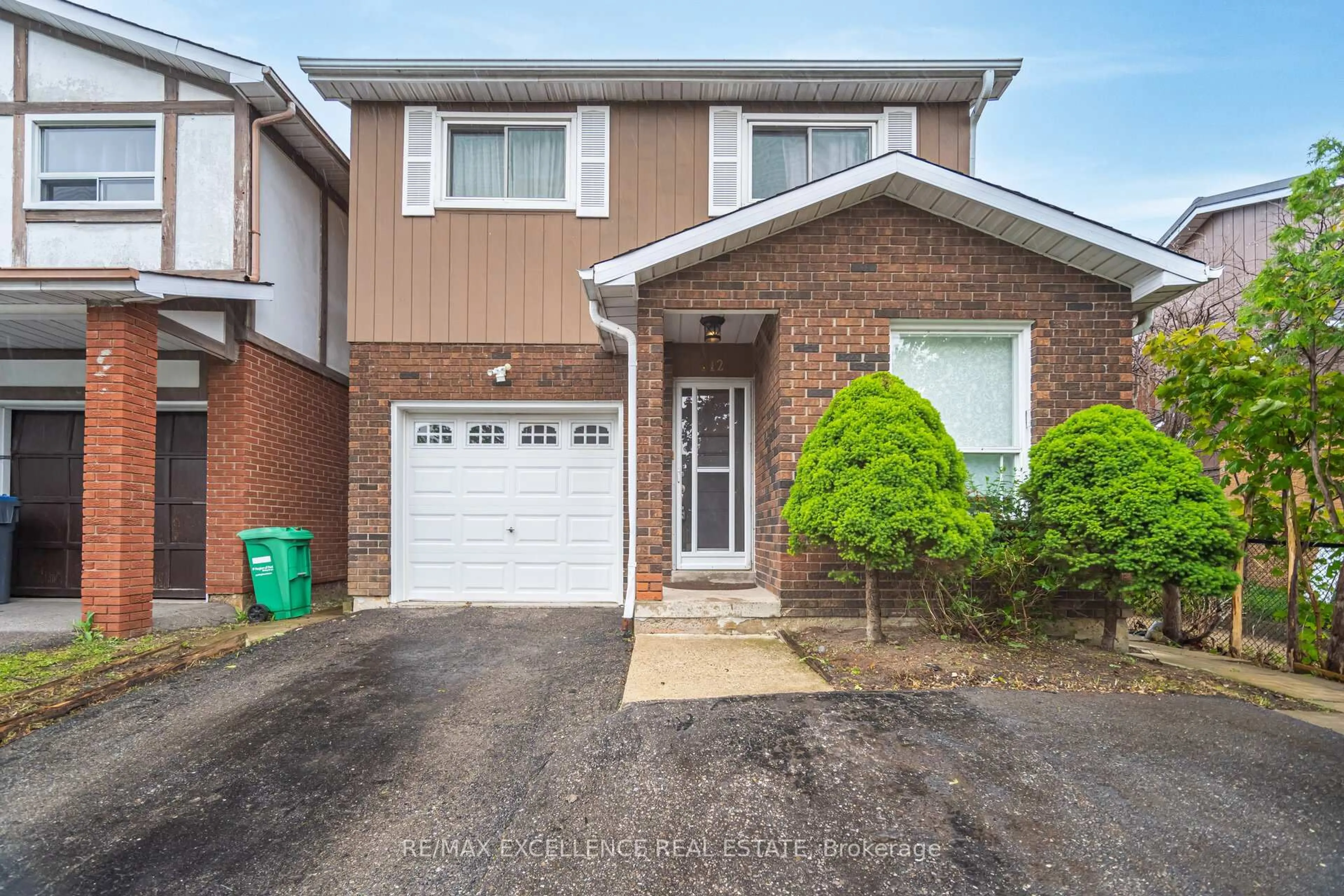 Home with brick exterior material, street for 112 Elderwood Pl, Brampton Ontario L6V 3N3