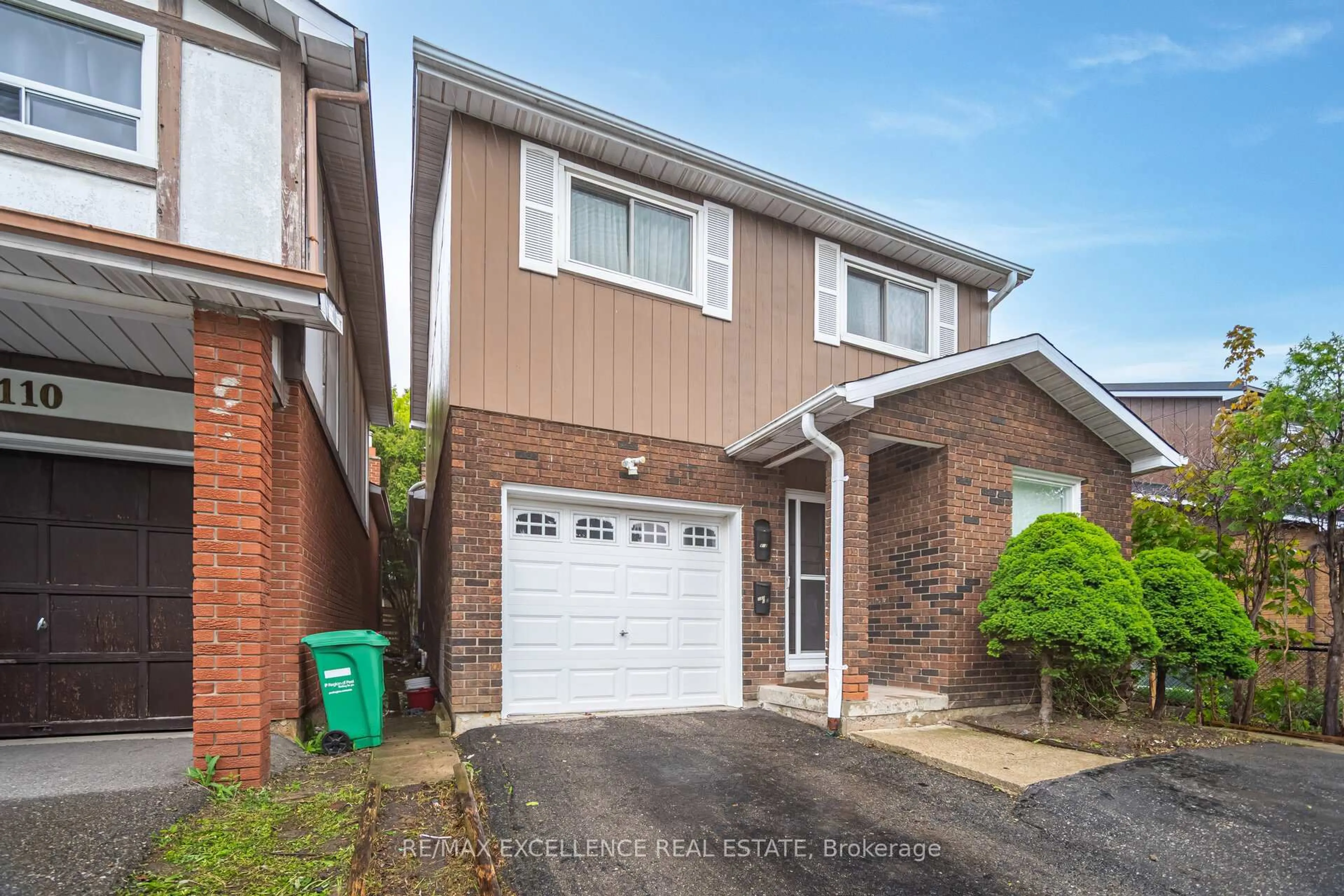 Home with brick exterior material, street for 112 Elderwood Pl, Brampton Ontario L6V 3N3