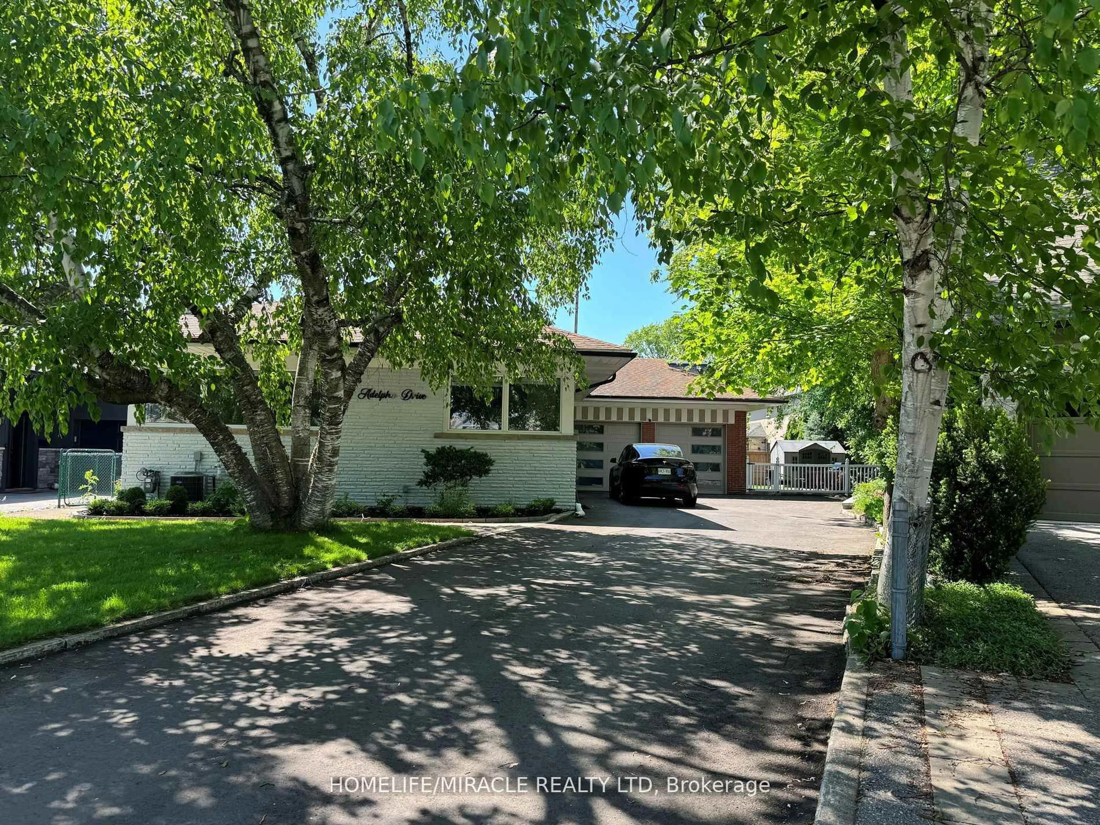 A pic from outside/outdoor area/front of a property/back of a property/a pic from drone, street for 11 Adelpha Dr, Toronto Ontario M8Z 3A1
