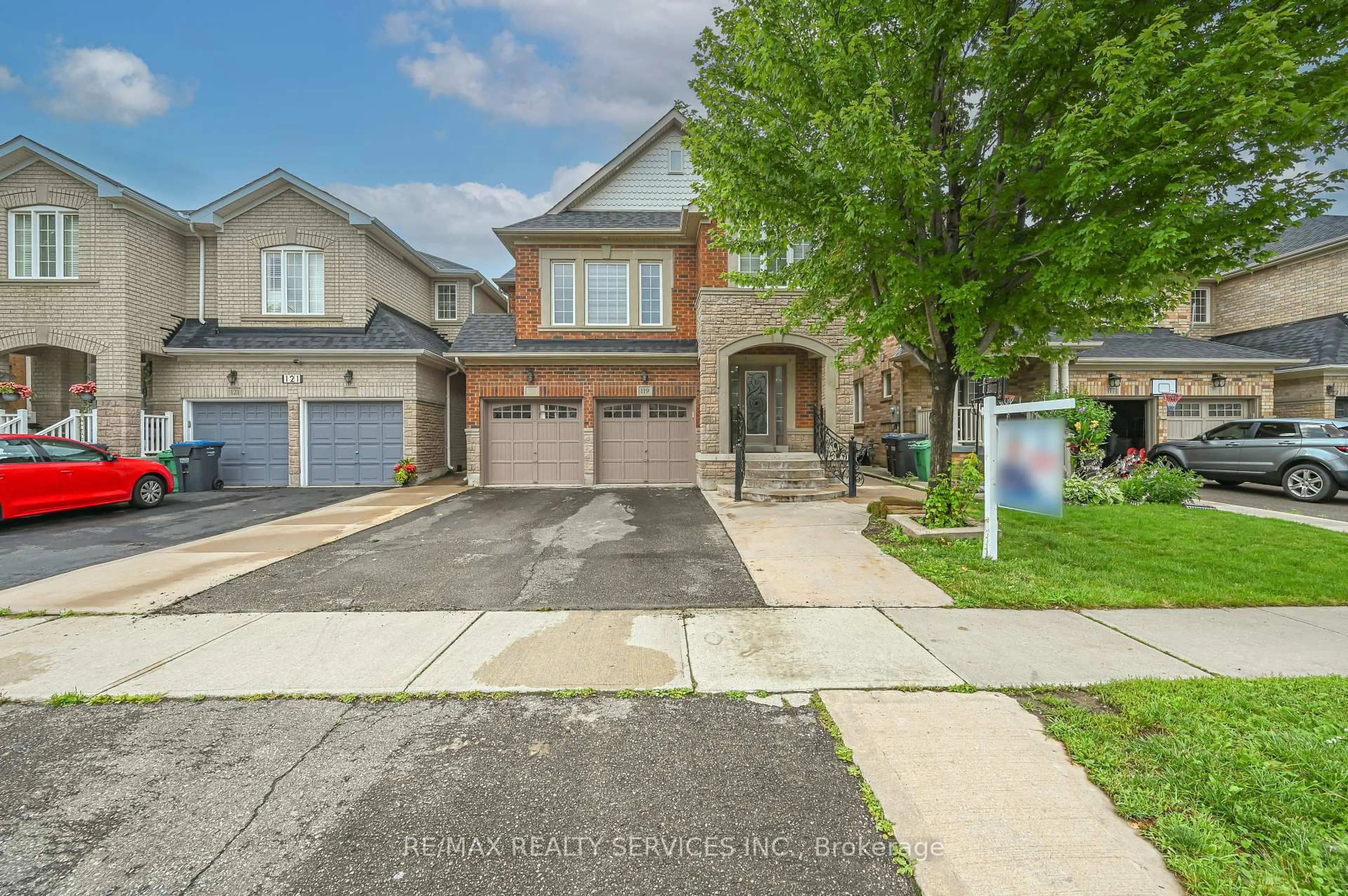 Home with brick exterior material, street for 119 Crown Victoria Dr, Brampton Ontario L7A 3X9