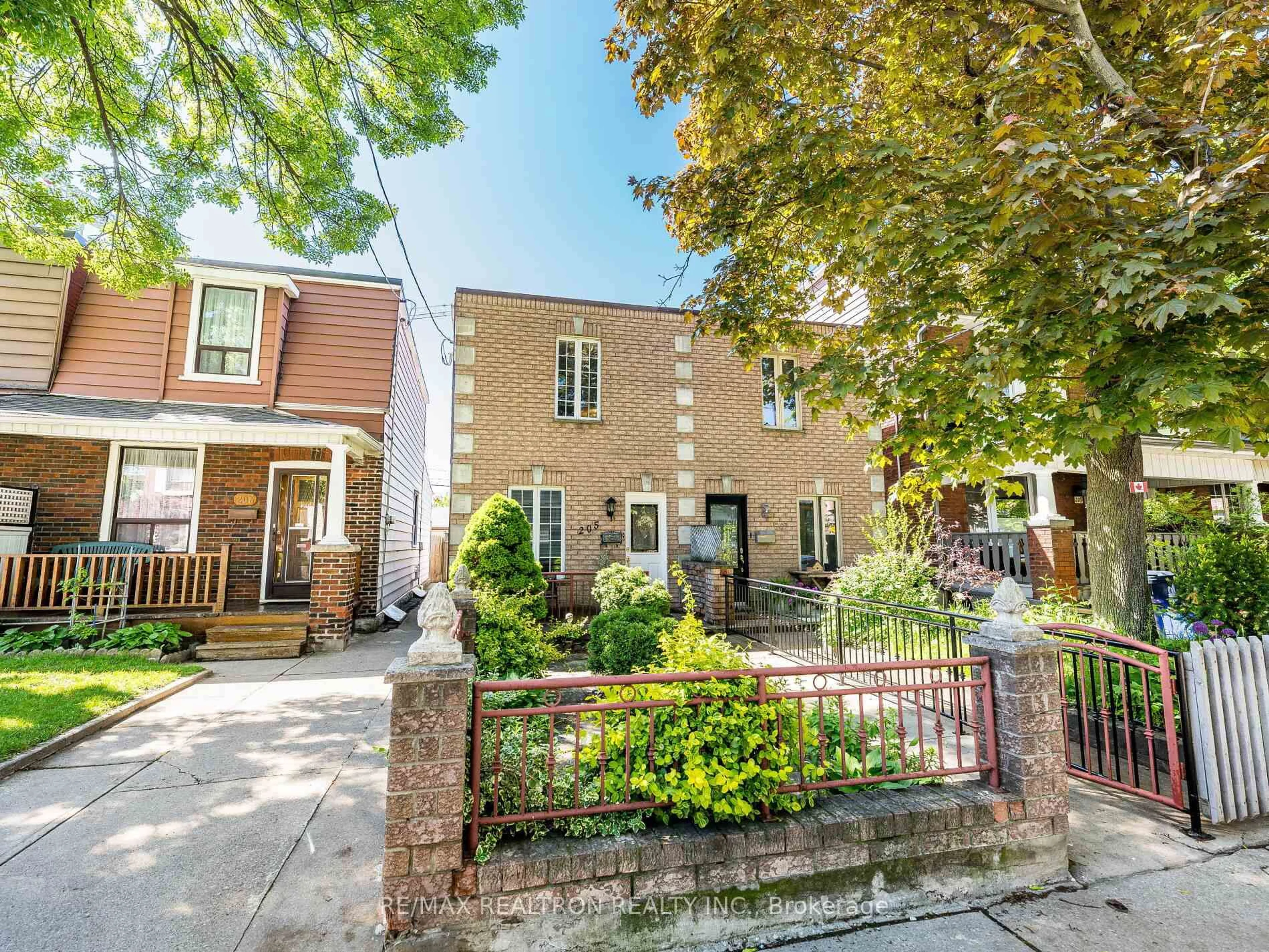 Home with brick exterior material, street for 205 Wallace Ave, Toronto Ontario M6H 1V5