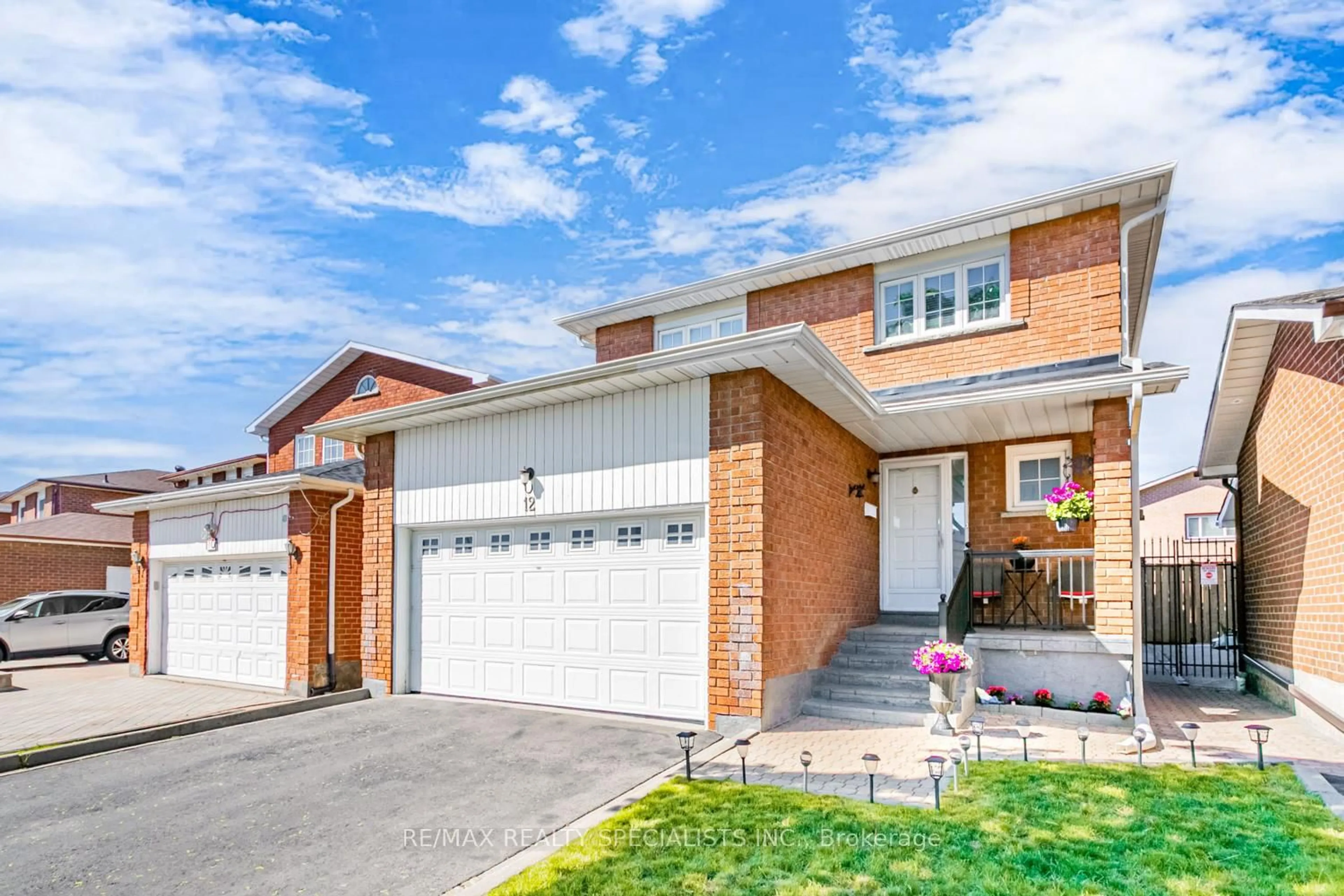 Home with brick exterior material, street for 12 Sonoma Way, Toronto Ontario M9V 4Y6