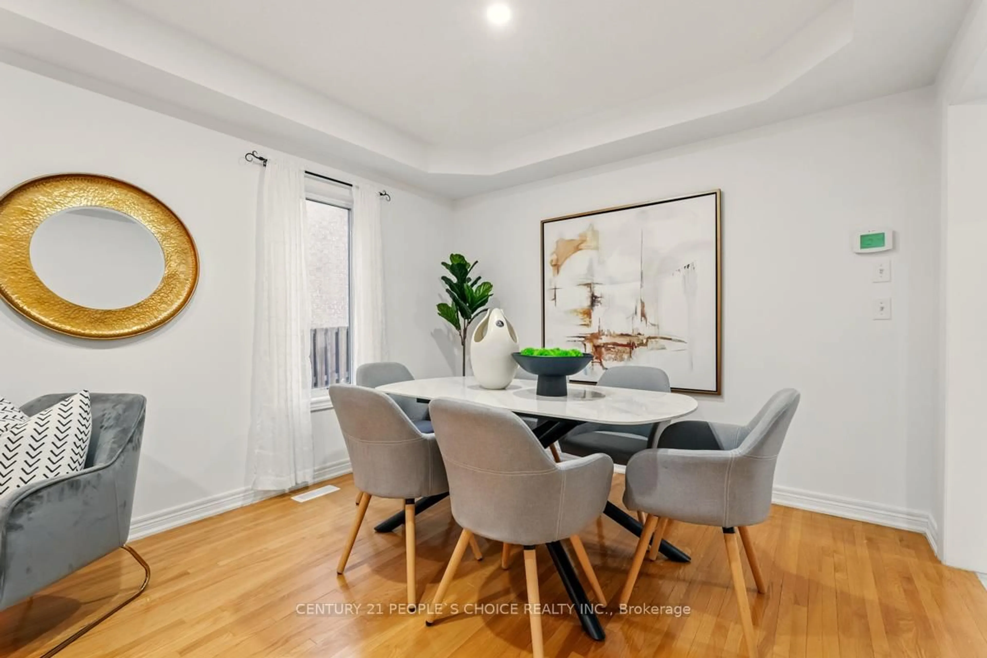 Dining room, wood/laminate floor for 67 Gallucci Cres, Brampton Ontario L6P 1R6
