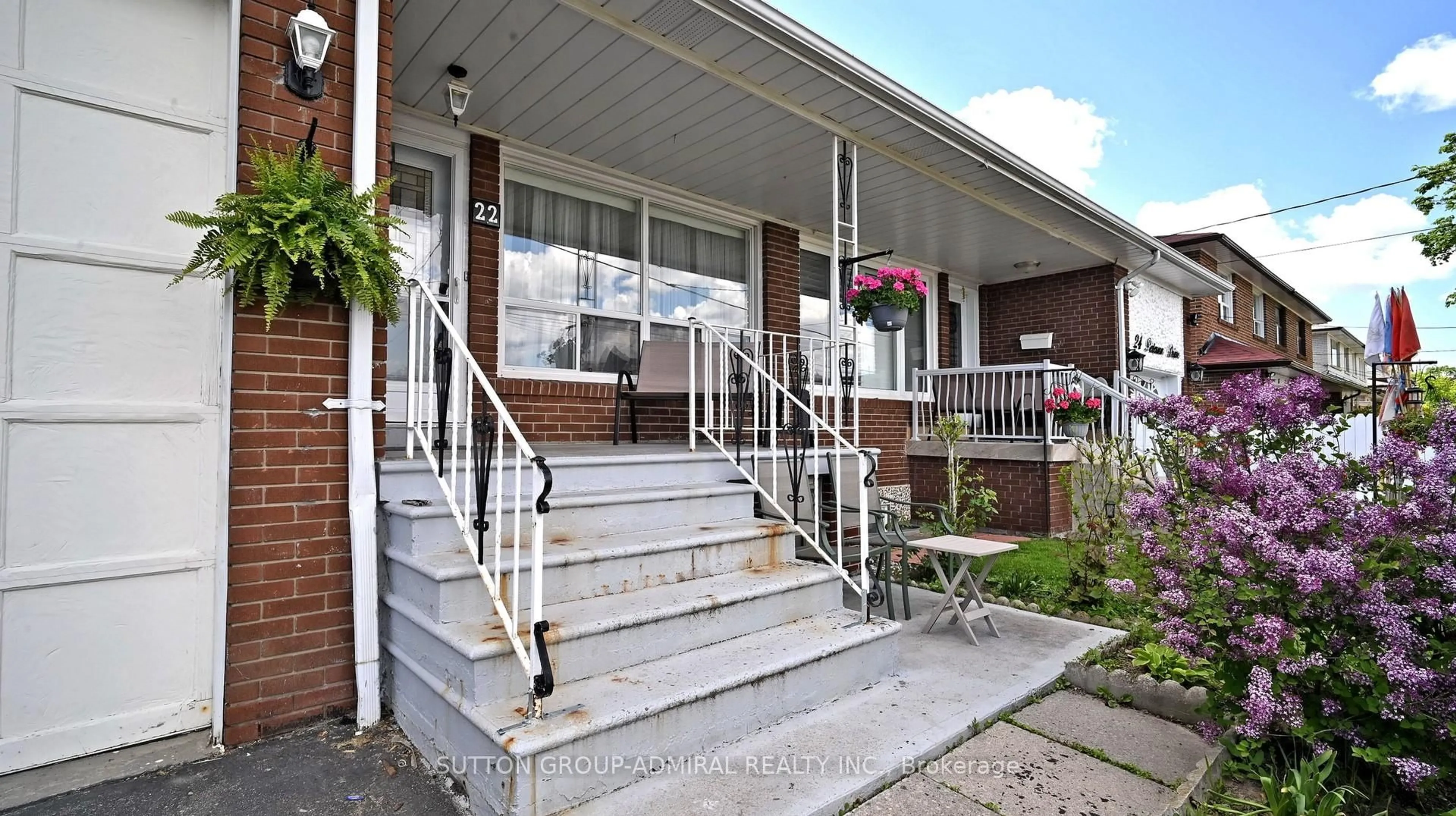 Home with brick exterior material, street for 22 Peterson Dr, Toronto Ontario M9M 1X1