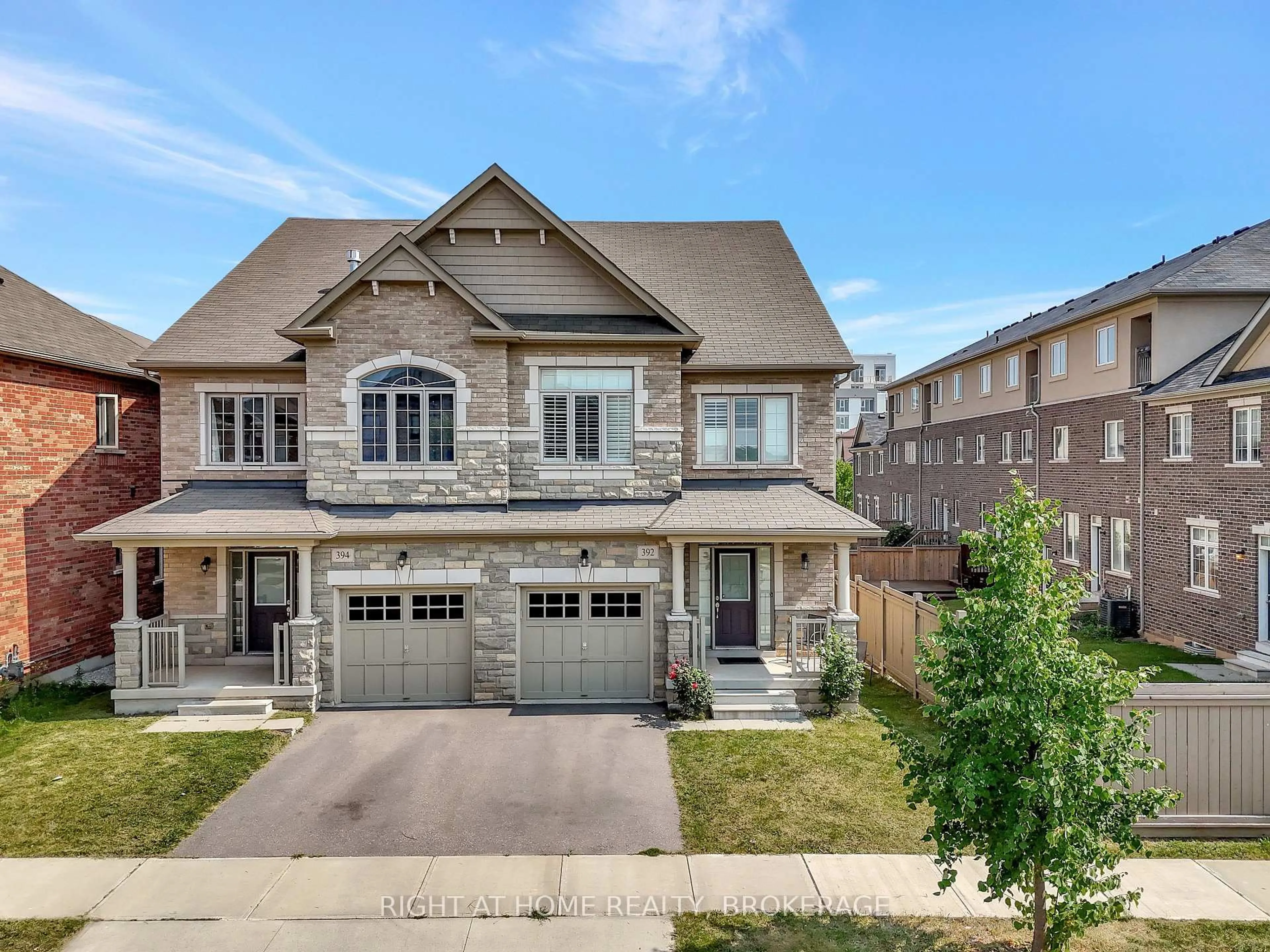 Home with brick exterior material, street for 392 Grindstone Tr, Oakville Ontario L6H 0S1