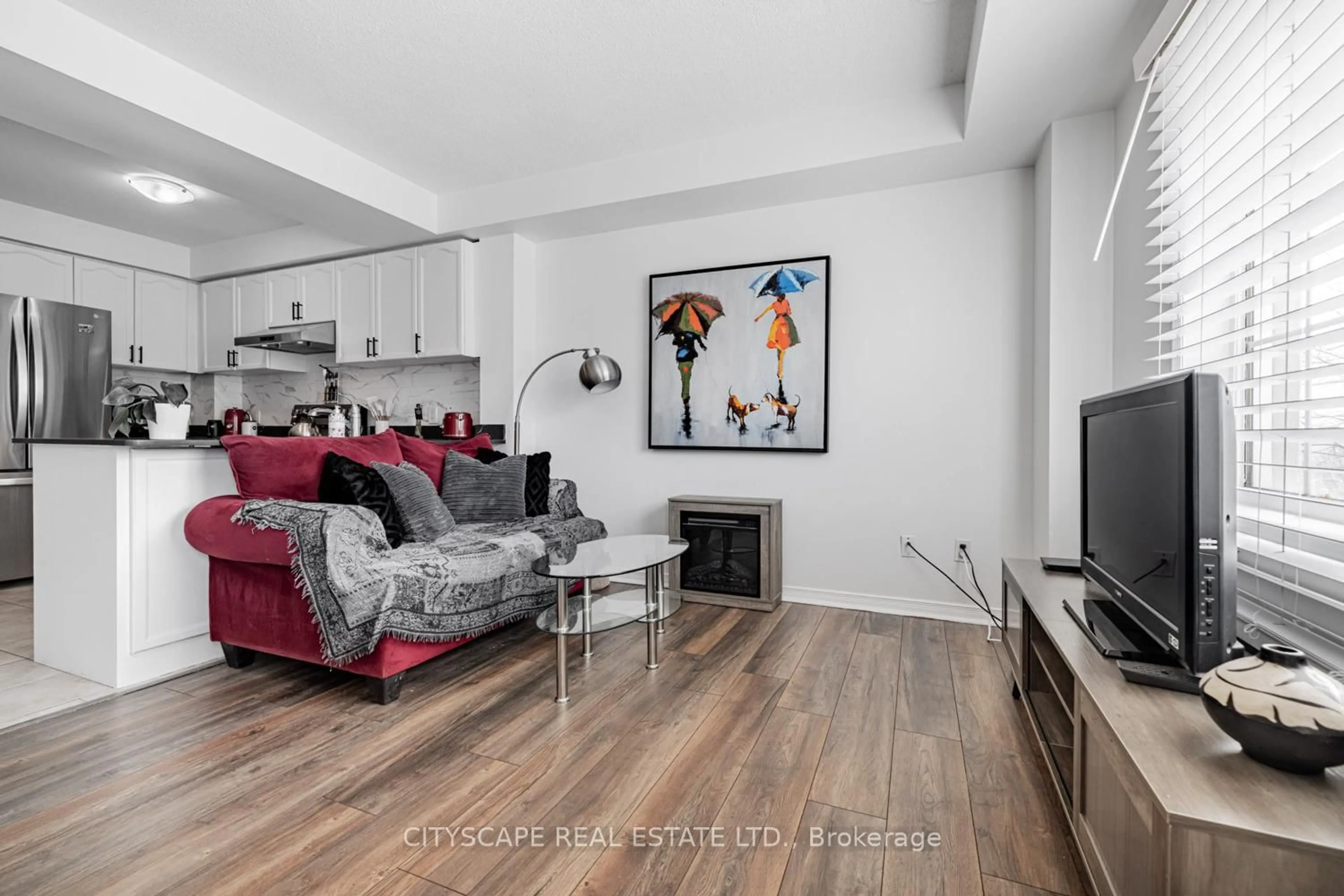 Living room with furniture, unknown for 3055 Elmcreek Rd #11, Mississauga Ontario L5B 4J9