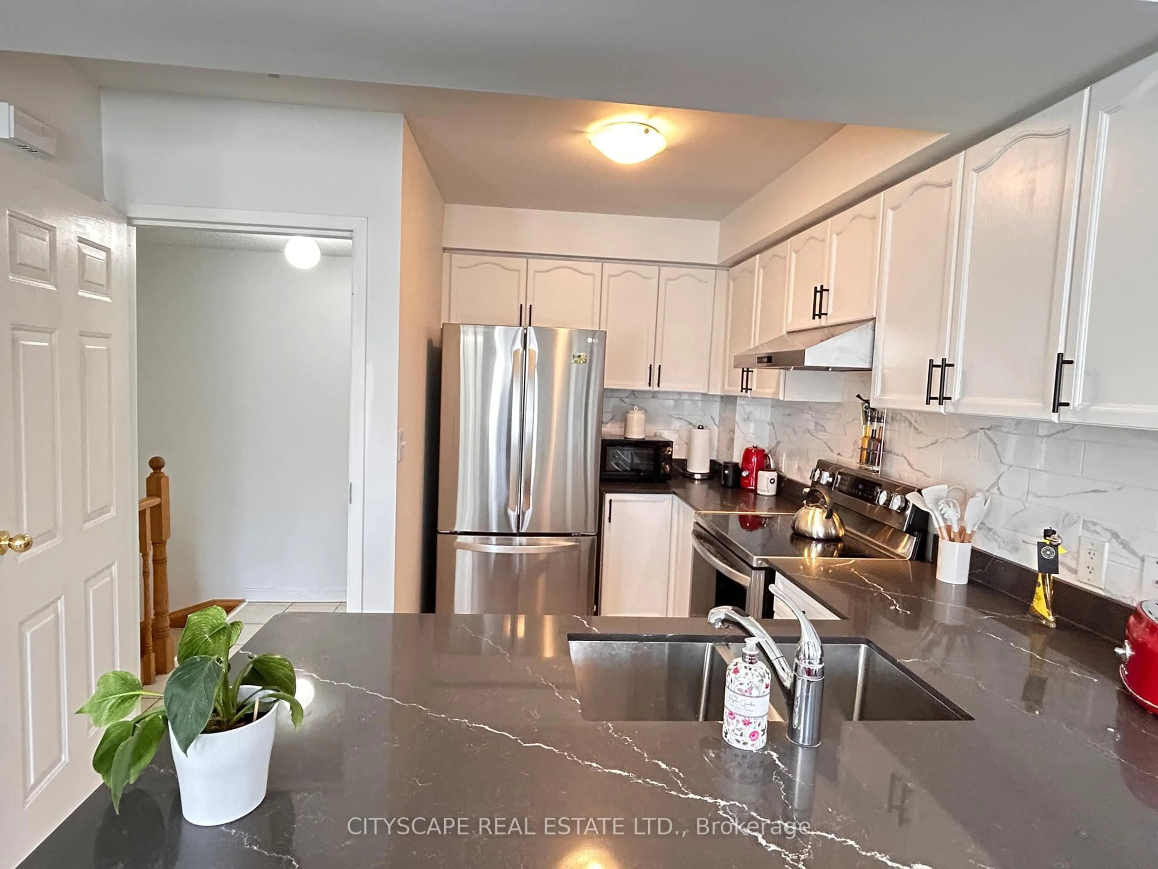 Open concept kitchen, unknown for 3055 Elmcreek Rd #11, Mississauga Ontario L5B 4J9