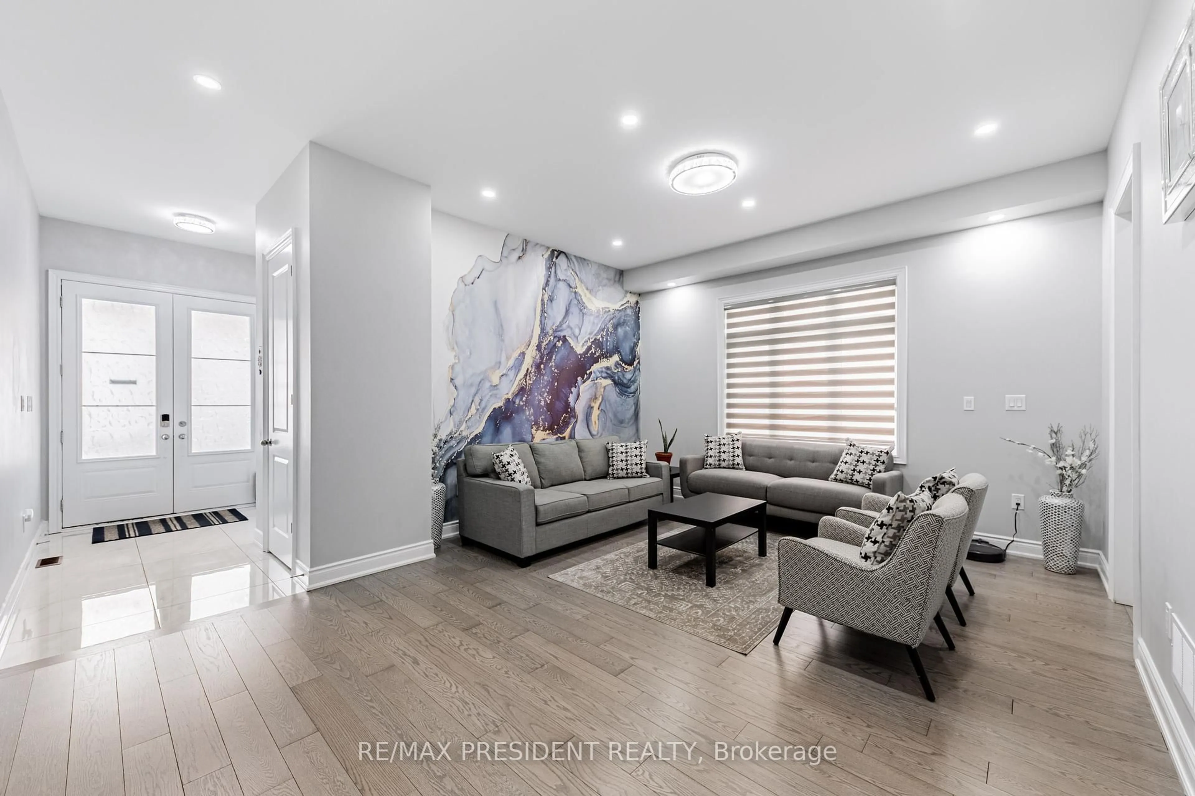 Living room with furniture, unknown for 32 Elderbridge Rd, Brampton Ontario L6P 4G5