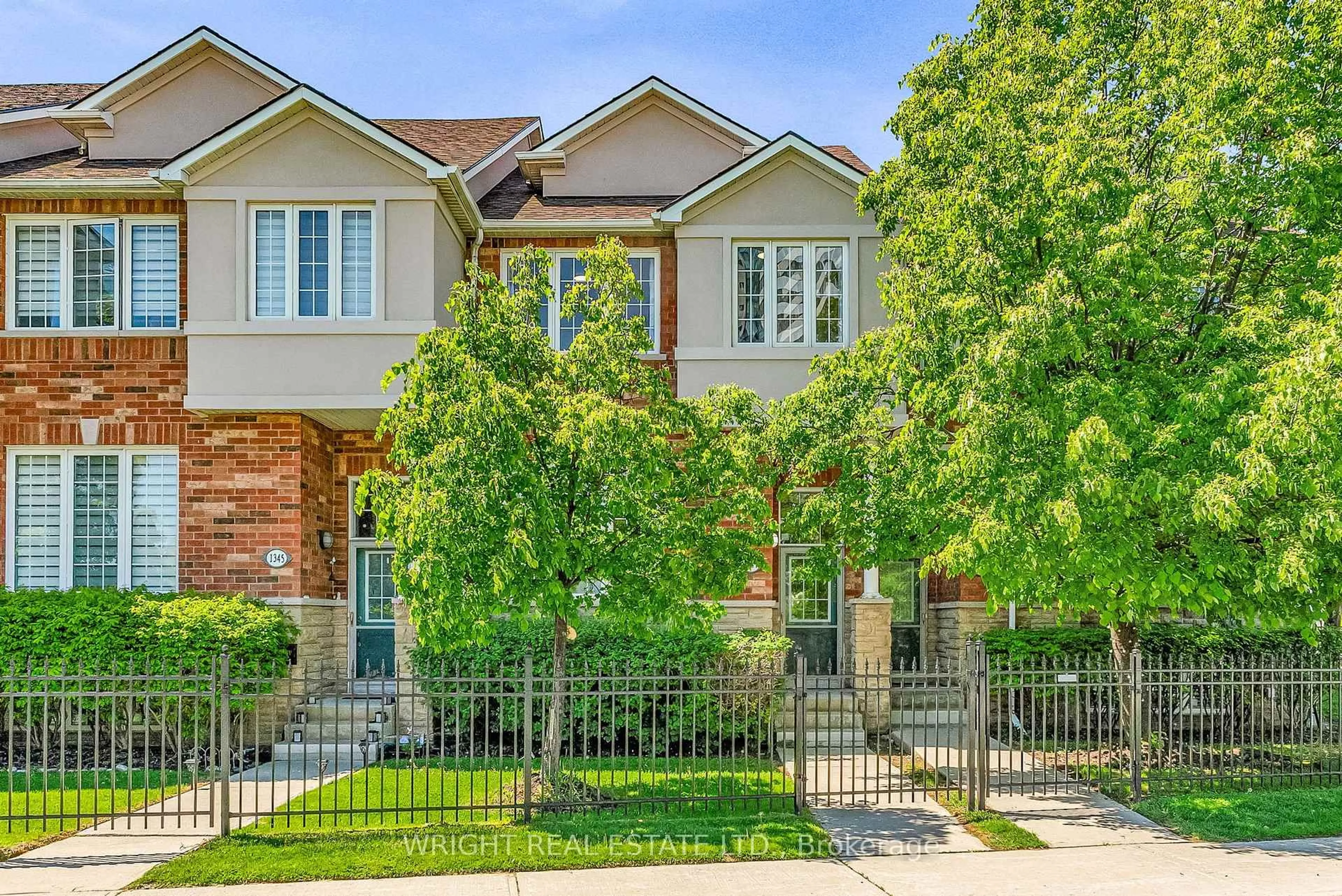 Home with brick exterior material, street for 1347 Rathburn Rd #4, Mississauga Ontario L4W 5R5