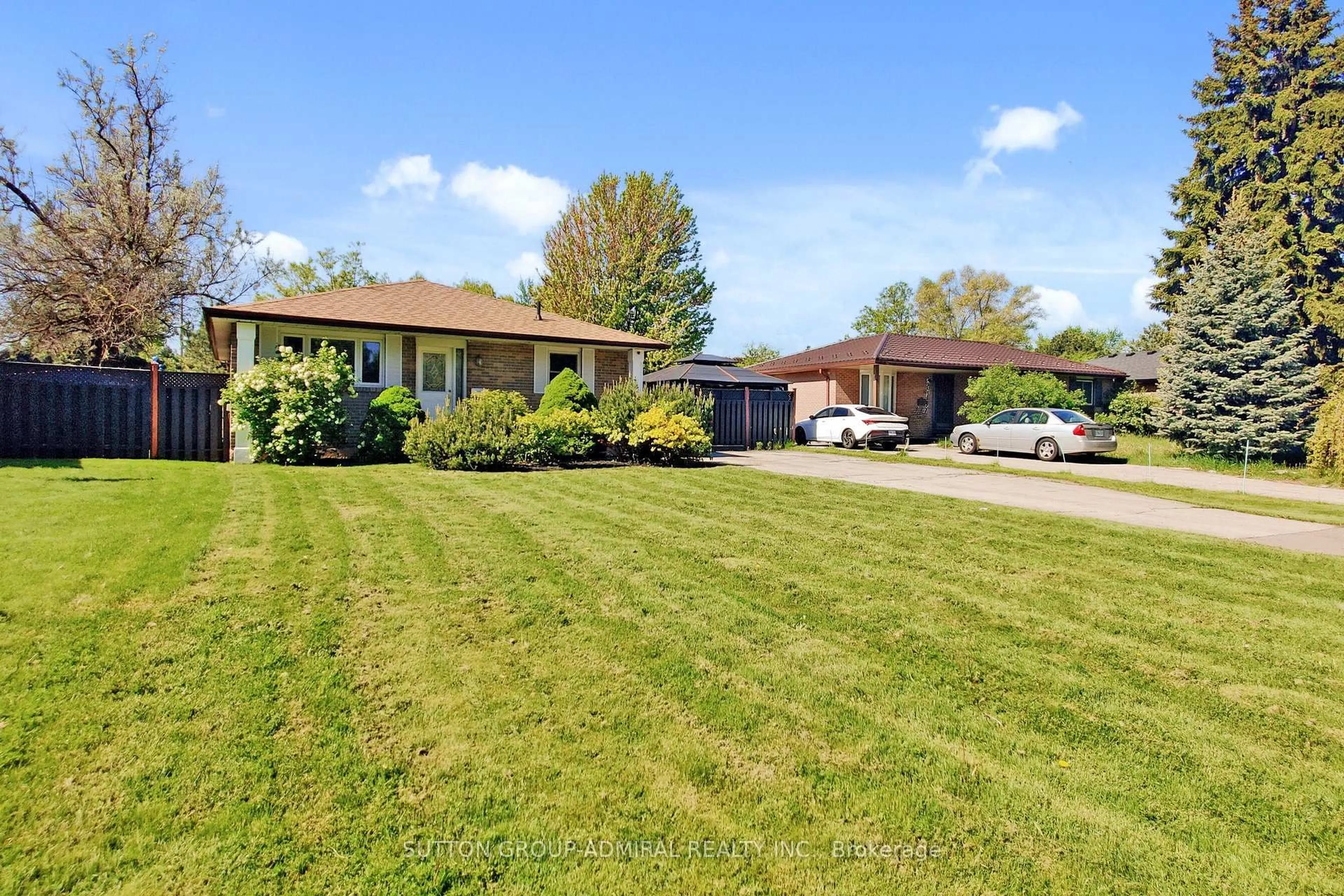 A pic from outside/outdoor area/front of a property/back of a property/a pic from drone, street for 12 Flavian Cres, Brampton Ontario L6T 3P3