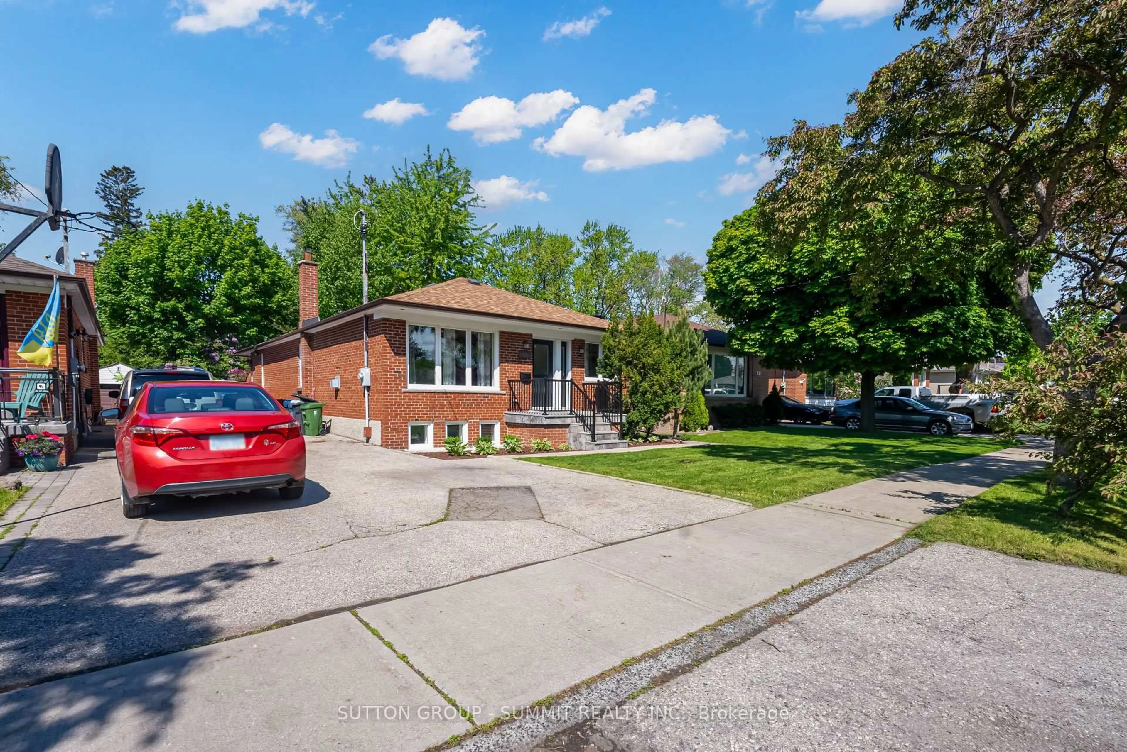 Home with brick exterior material, street for 47 RAYSIDE Dr, Toronto Ontario M9C 1S9