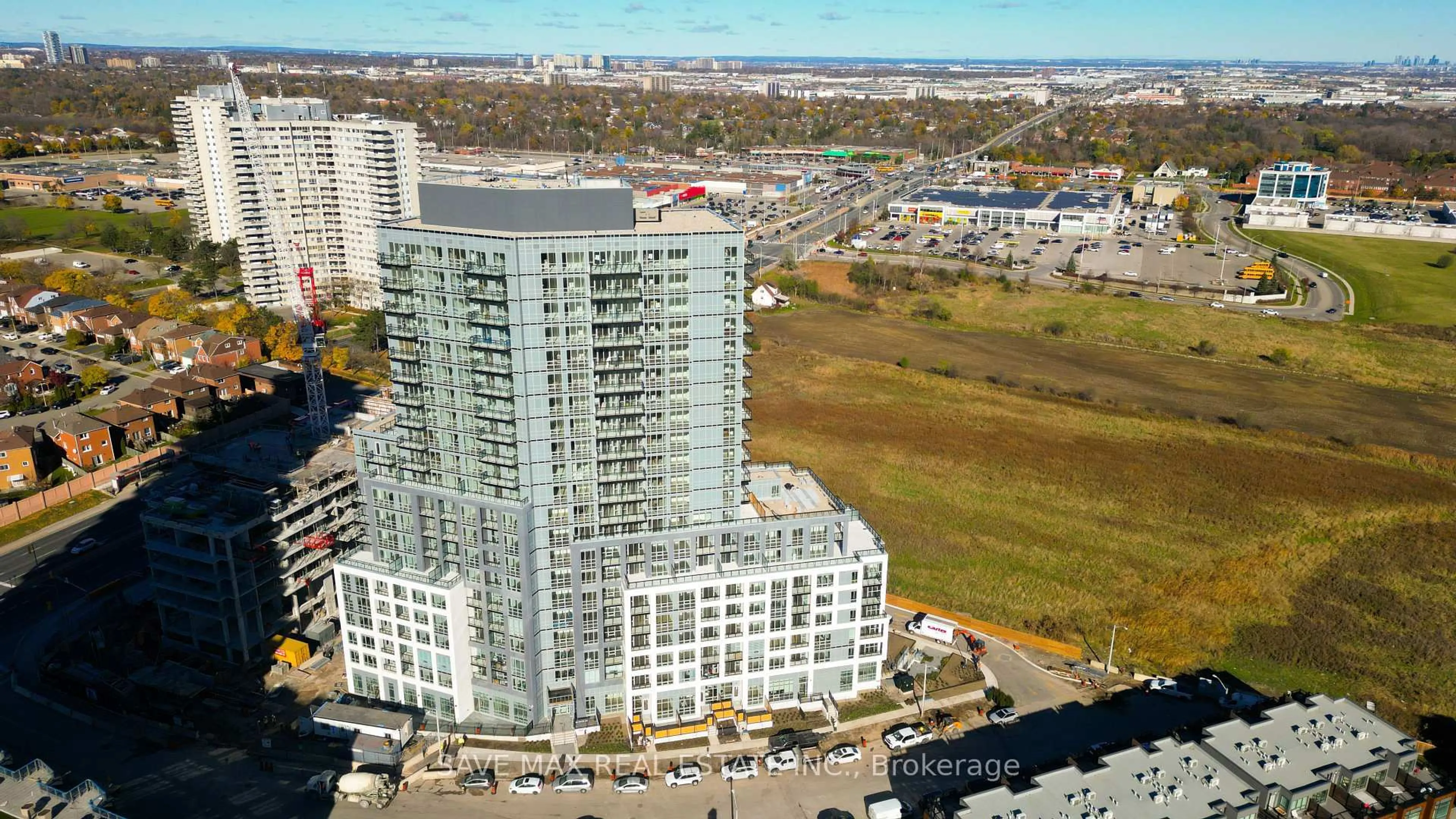 A pic from outside/outdoor area/front of a property/back of a property/a pic from drone, city buildings view from balcony for 225 Malta Ave #421, Brampton Ontario L6Y 6L6