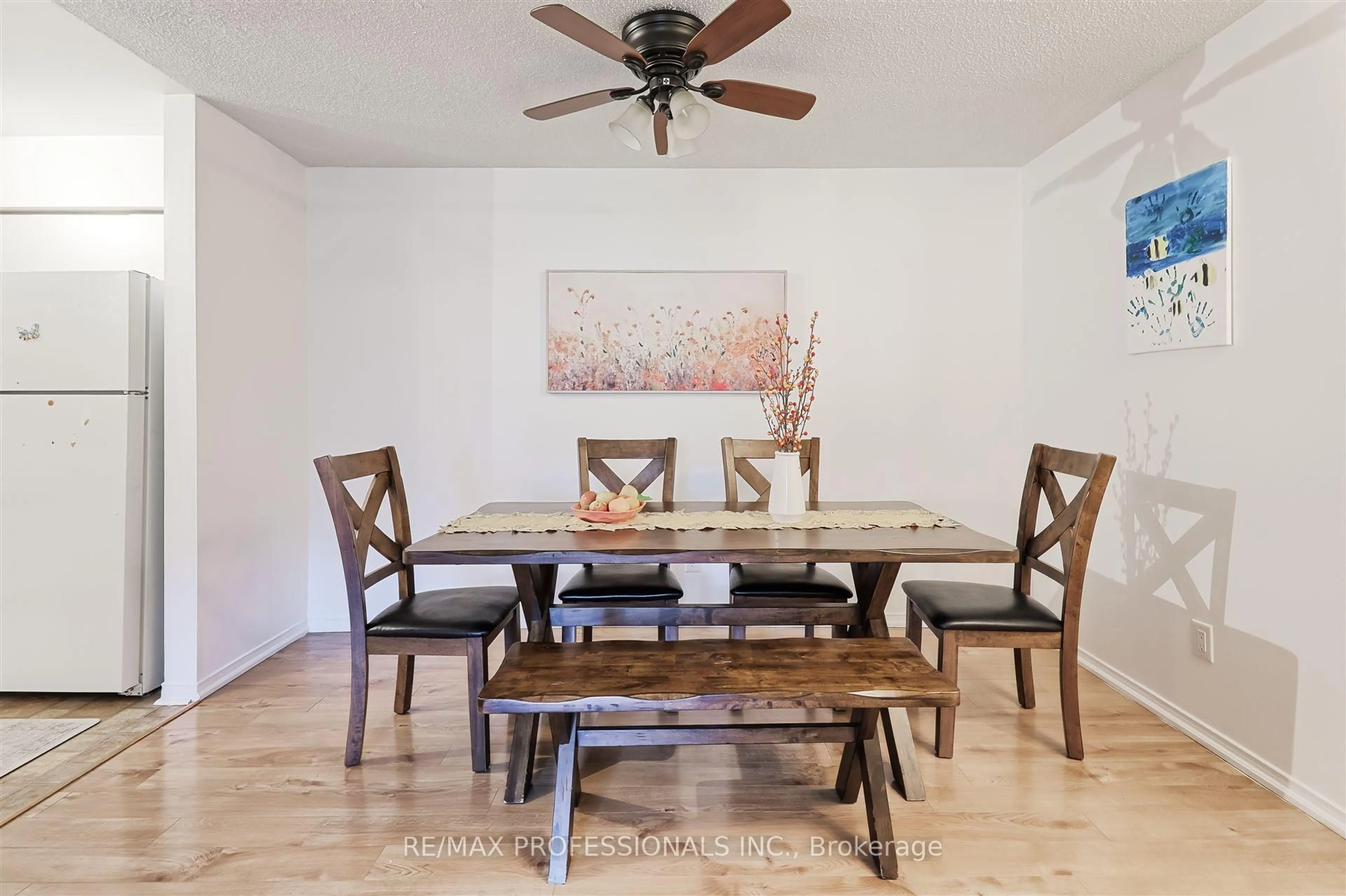 Dining room, wood/laminate floor for 1500 Pilgrims Way #324, Oakville Ontario L6M 3G9