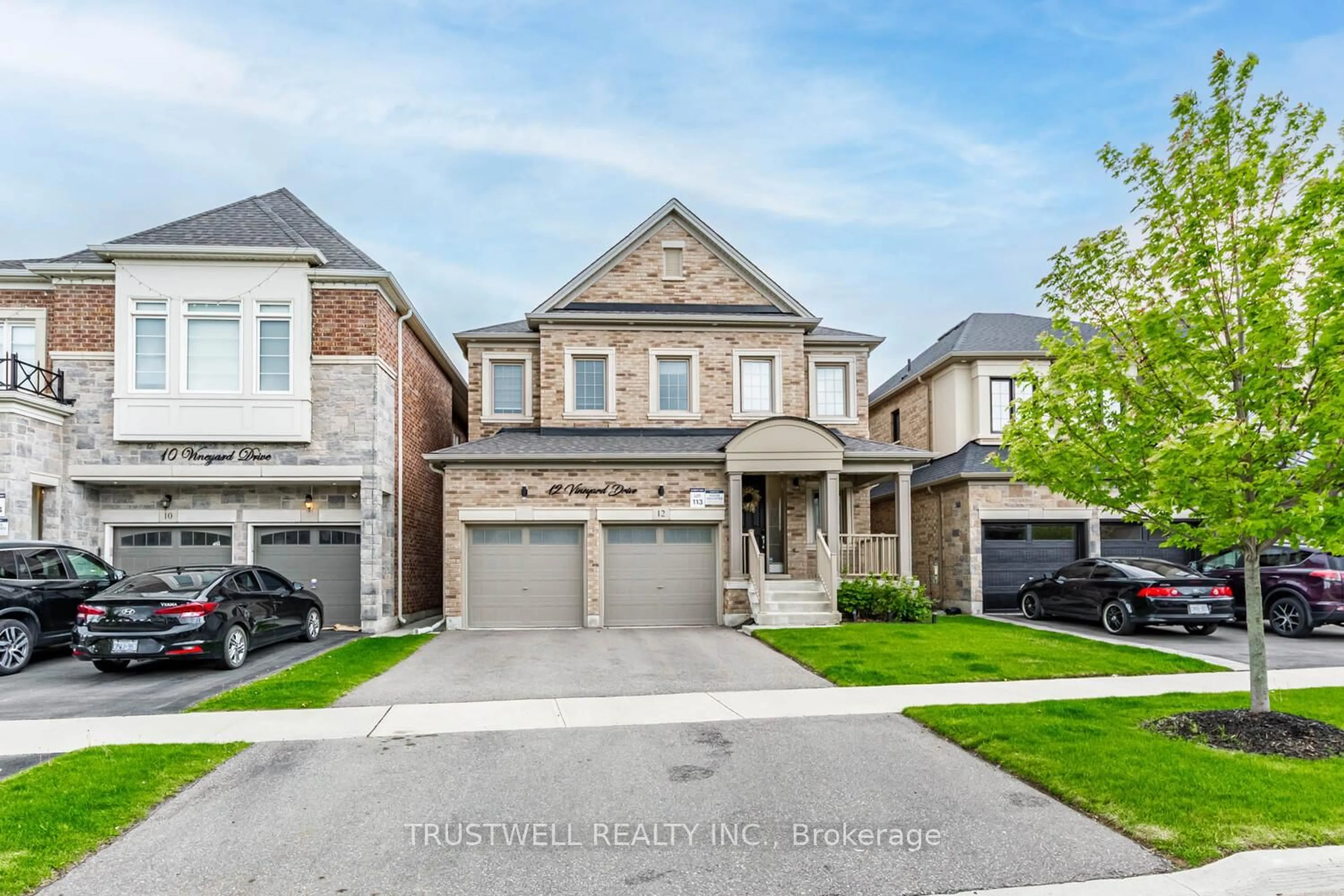 Home with brick exterior material, street for 12 Vineyard Dr, Brampton Ontario L6Y 2A5