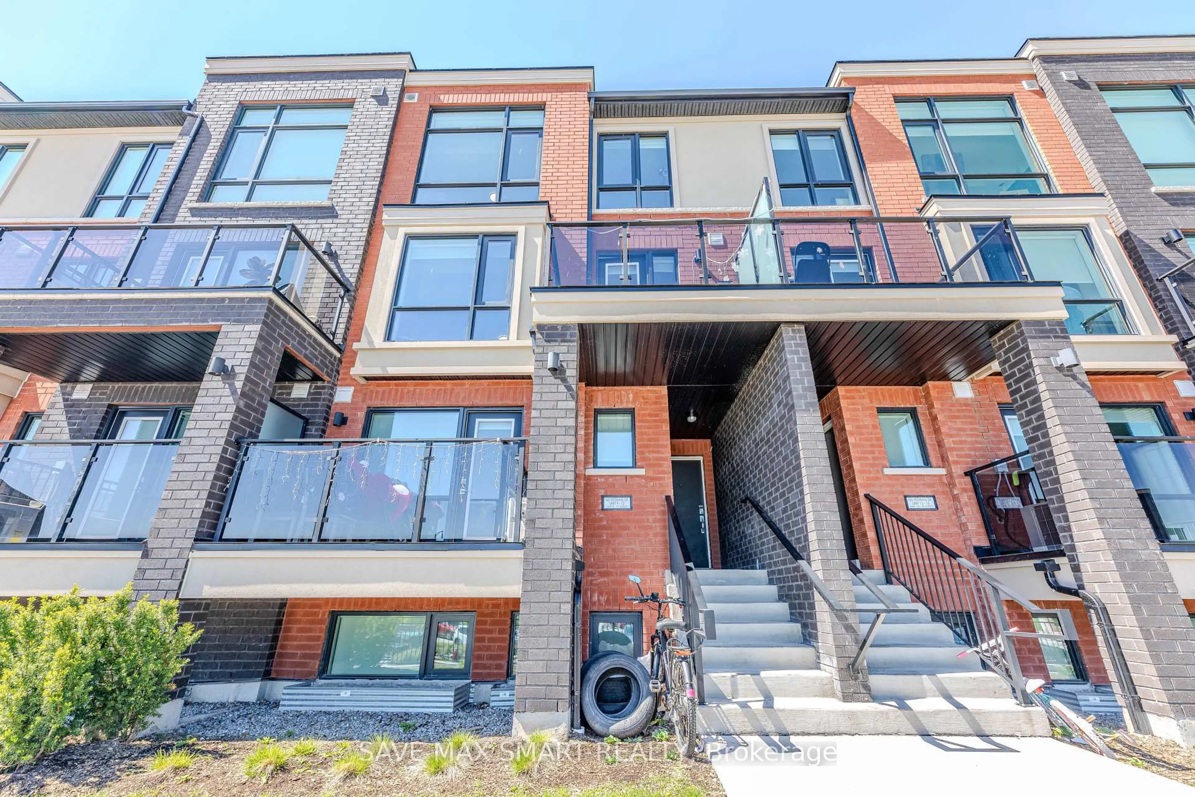 Home with brick exterior material, street for 165 Veterans Dr #11, Brampton Ontario L7A 5L2