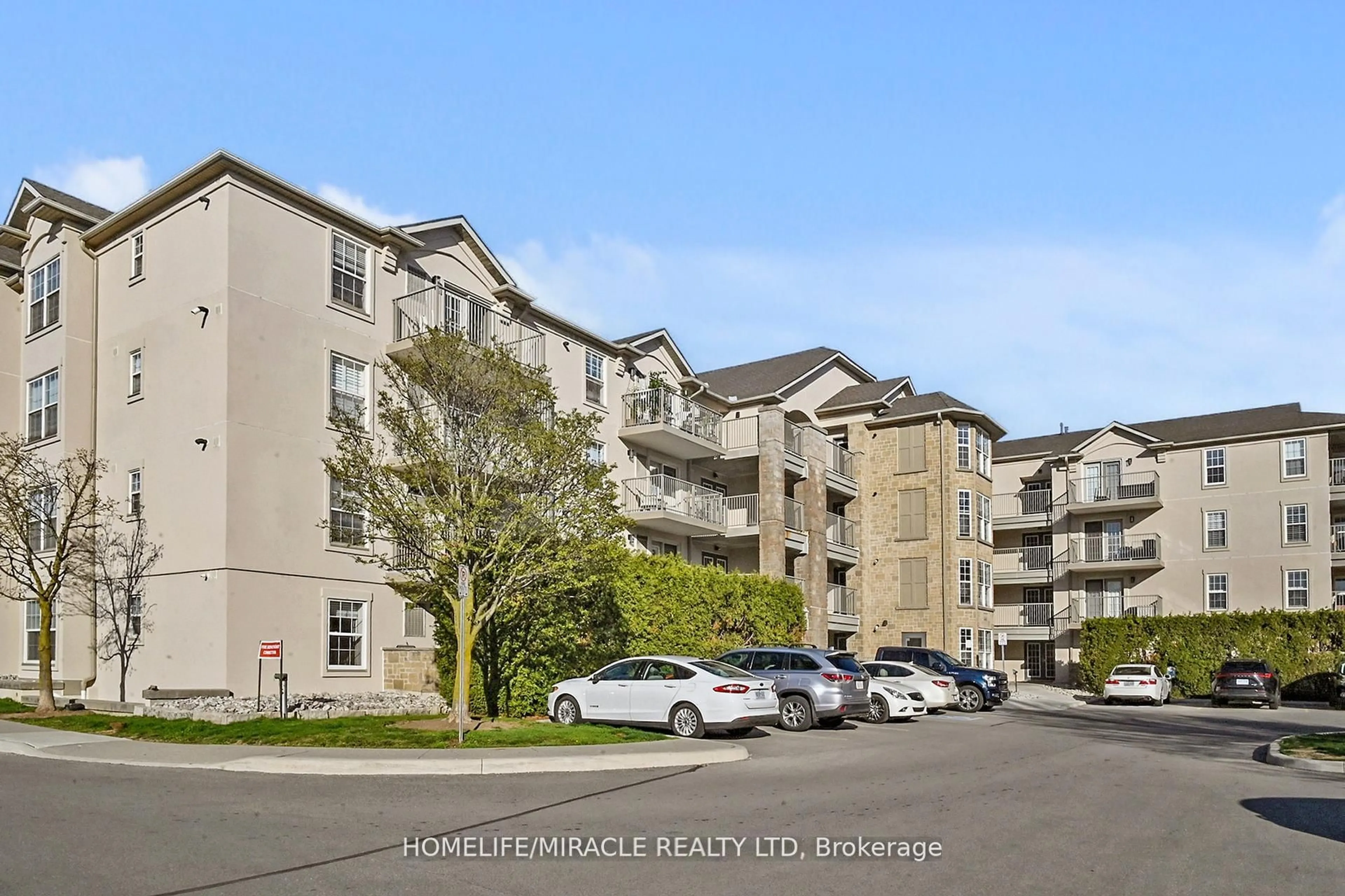 A pic from outside/outdoor area/front of a property/back of a property/a pic from drone, unknown for 1440 Bishops Gate #306, Oakville Ontario L6M 4M9