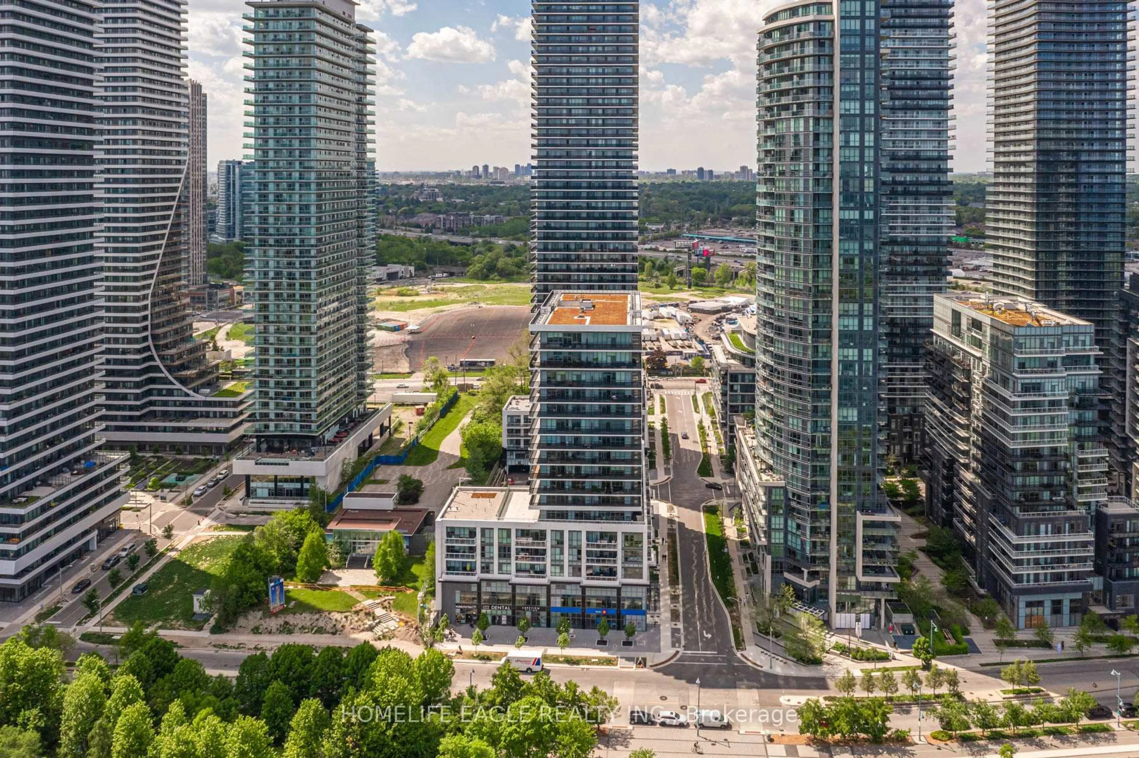 A pic from outside/outdoor area/front of a property/back of a property/a pic from drone, city buildings view from balcony for 65 Annie Craig Dr #709, Toronto Ontario M8V 0G3