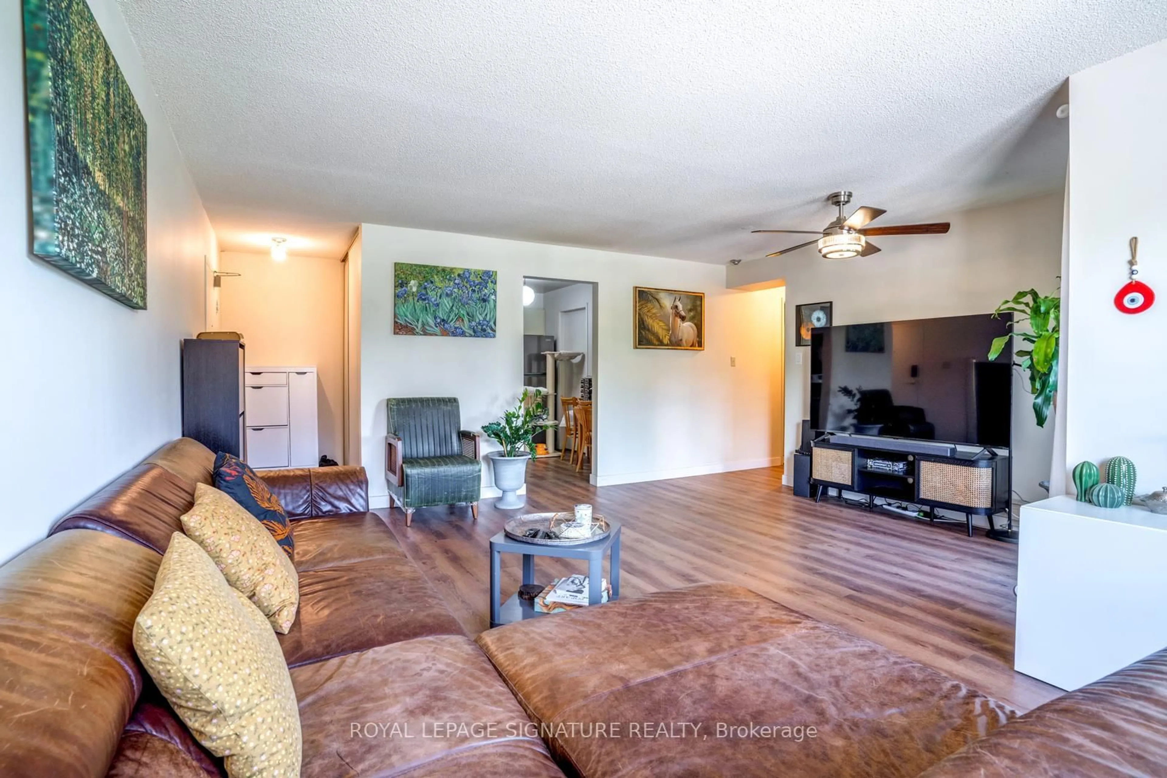 Living room with furniture, unknown for 3841 Lake Shore Blvd #218, Toronto Ontario M8W 1R2