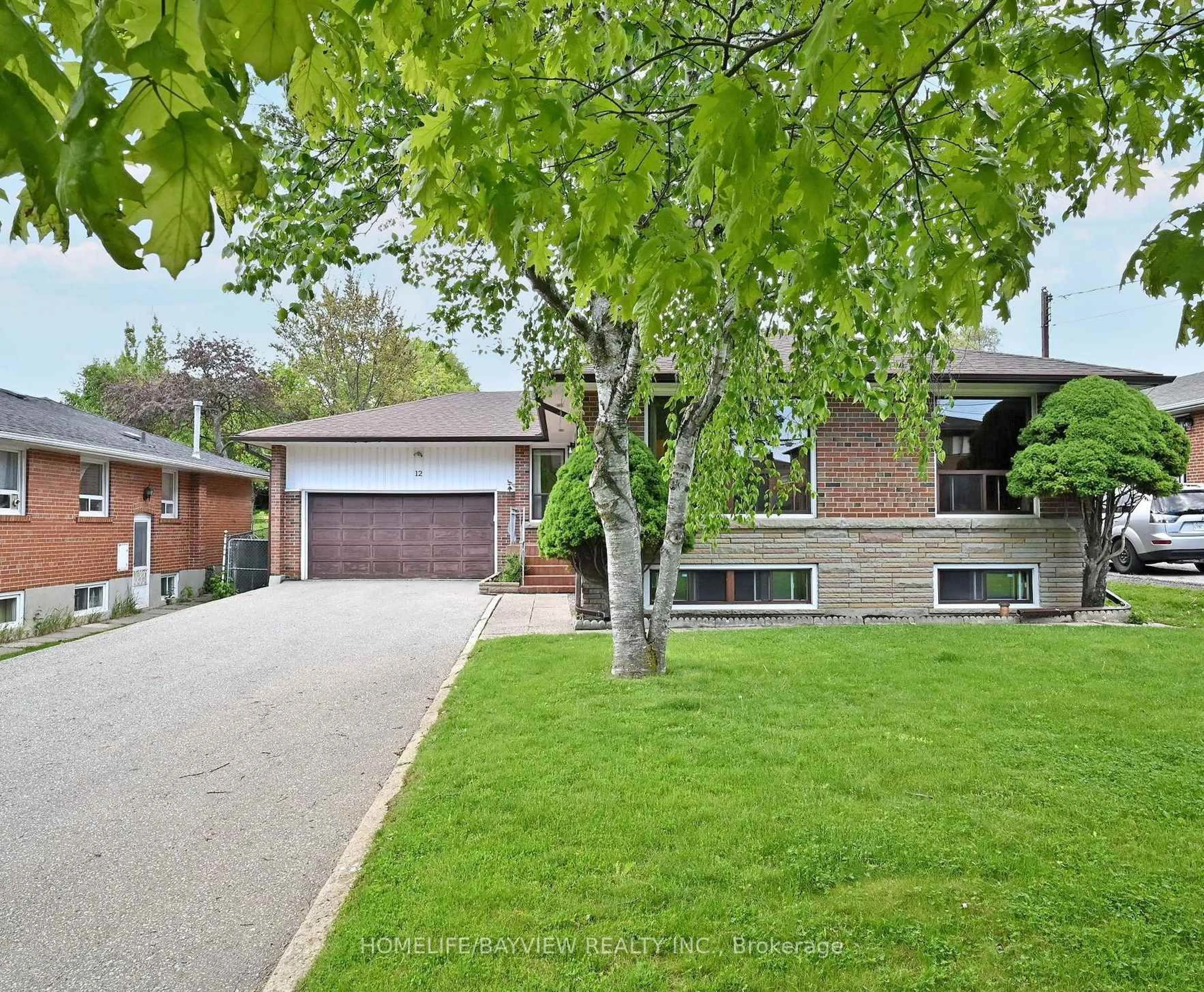 Home with brick exterior material, street for 12 Quinan Dr, Toronto Ontario M6L 1E9