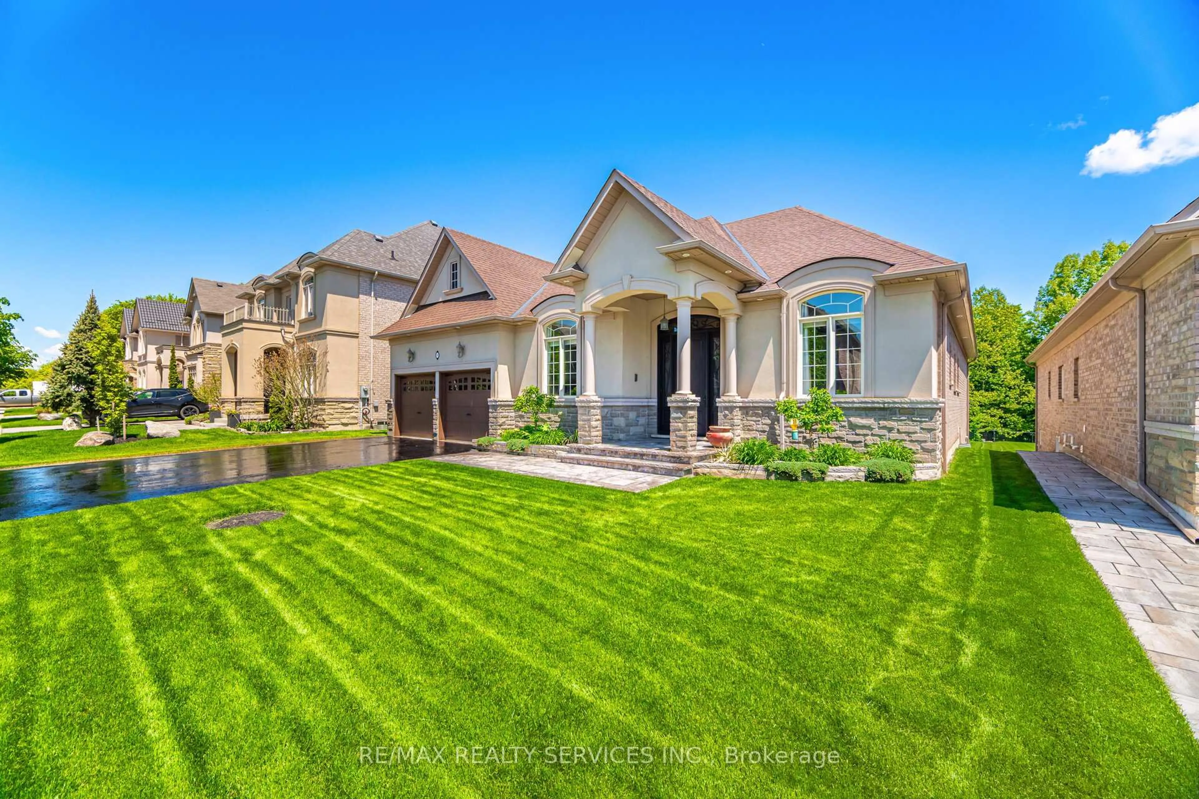 Home with brick exterior material, street for 48 Beacon Hill Dr, Brampton Ontario L6X 0V7