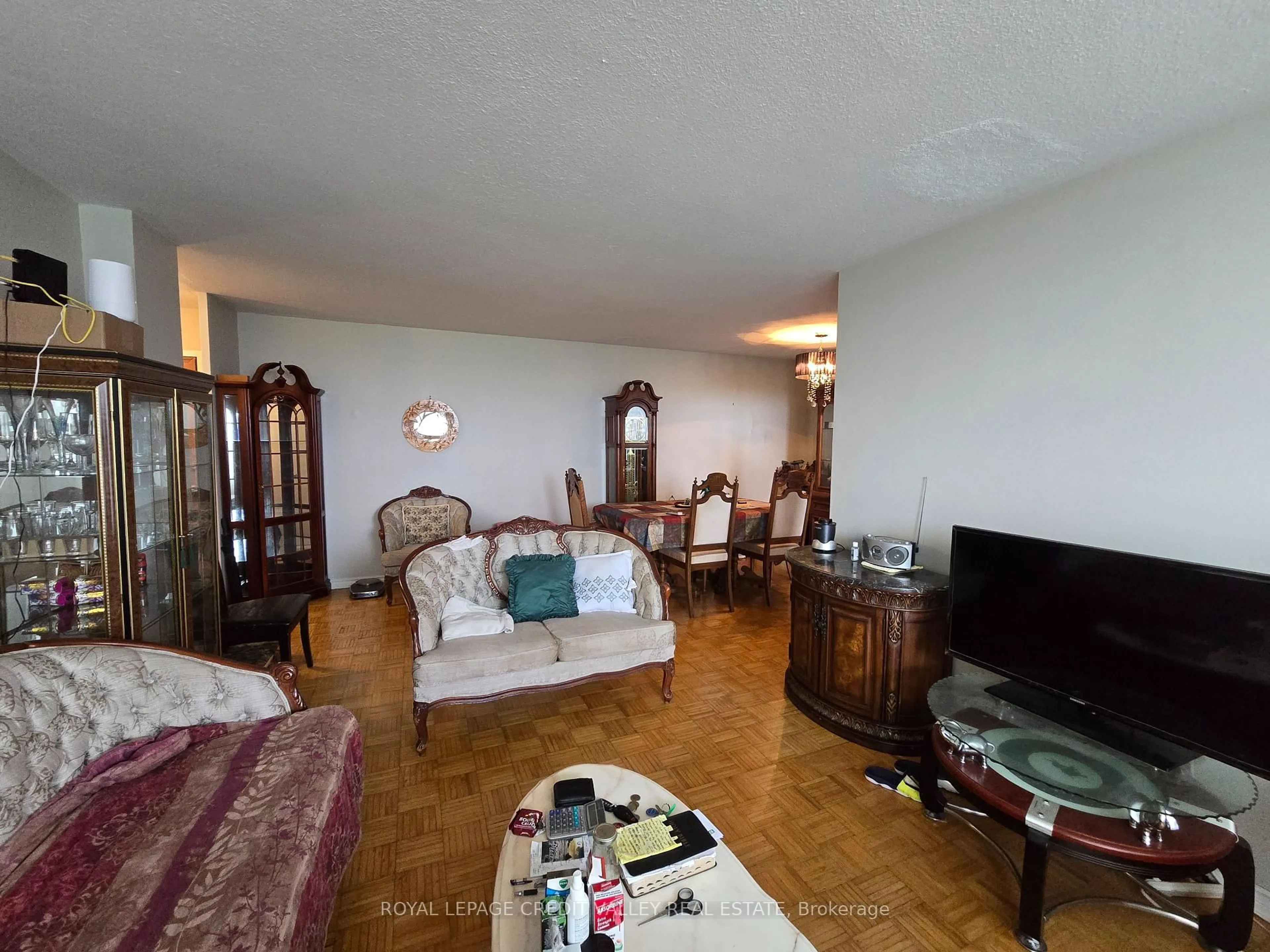 Living room with furniture, unknown for 235 Grandravine Dr #1705, Toronto Ontario M3N 1J2