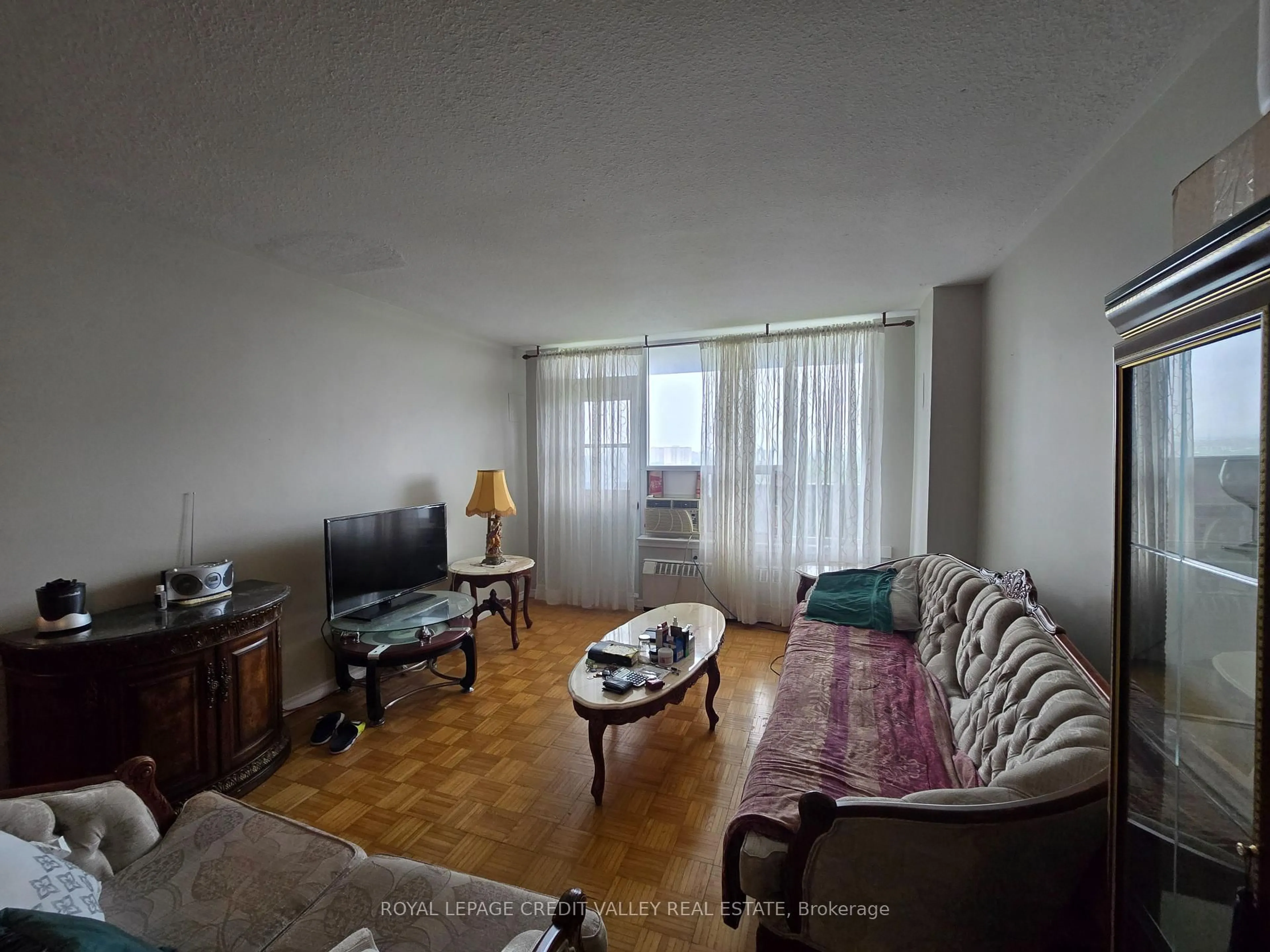 Living room with furniture, unknown for 235 Grandravine Dr #1705, Toronto Ontario M3N 1J2