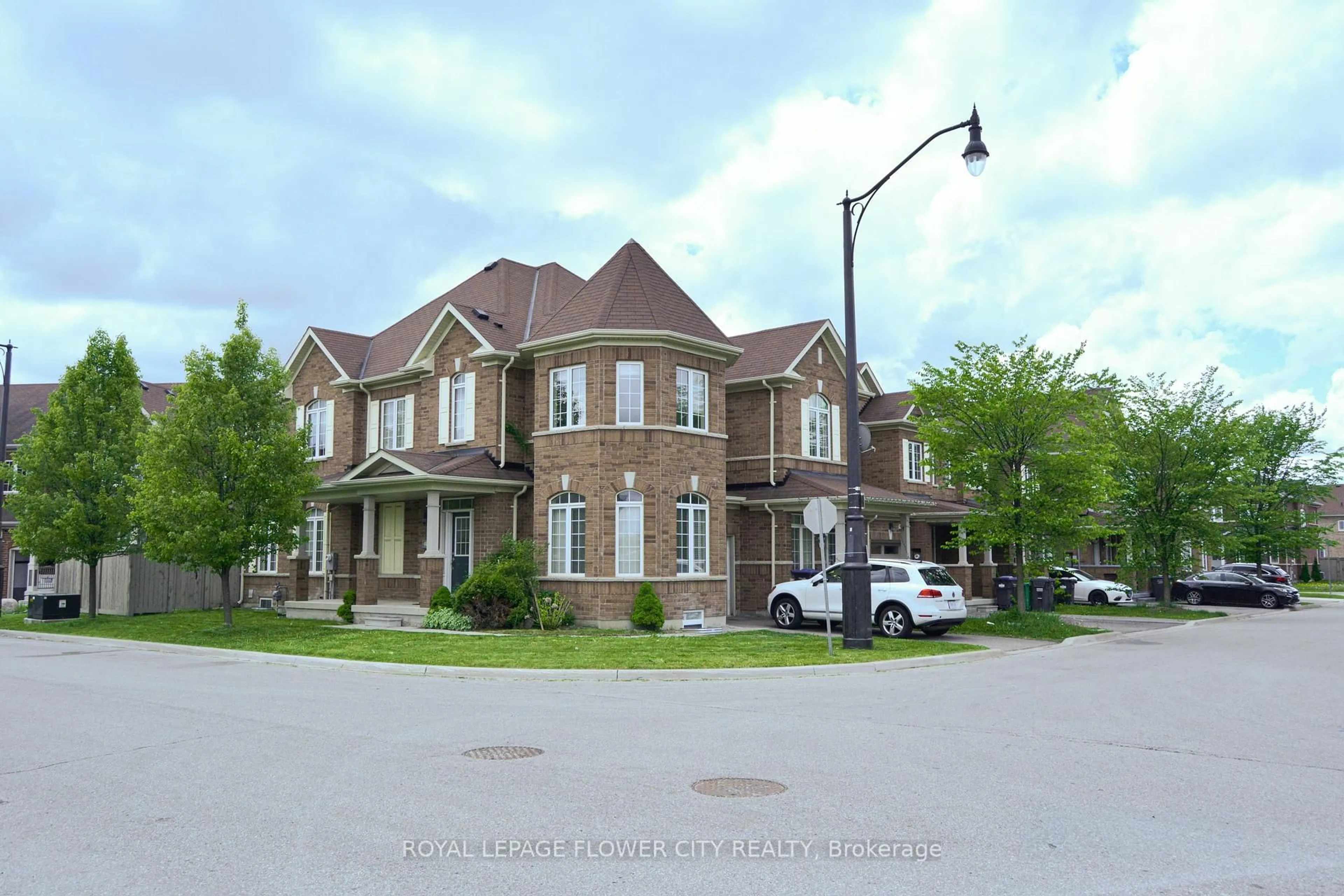 Home with brick exterior material, street for 19 Primo Rd, Brampton Ontario L7A 0Z9