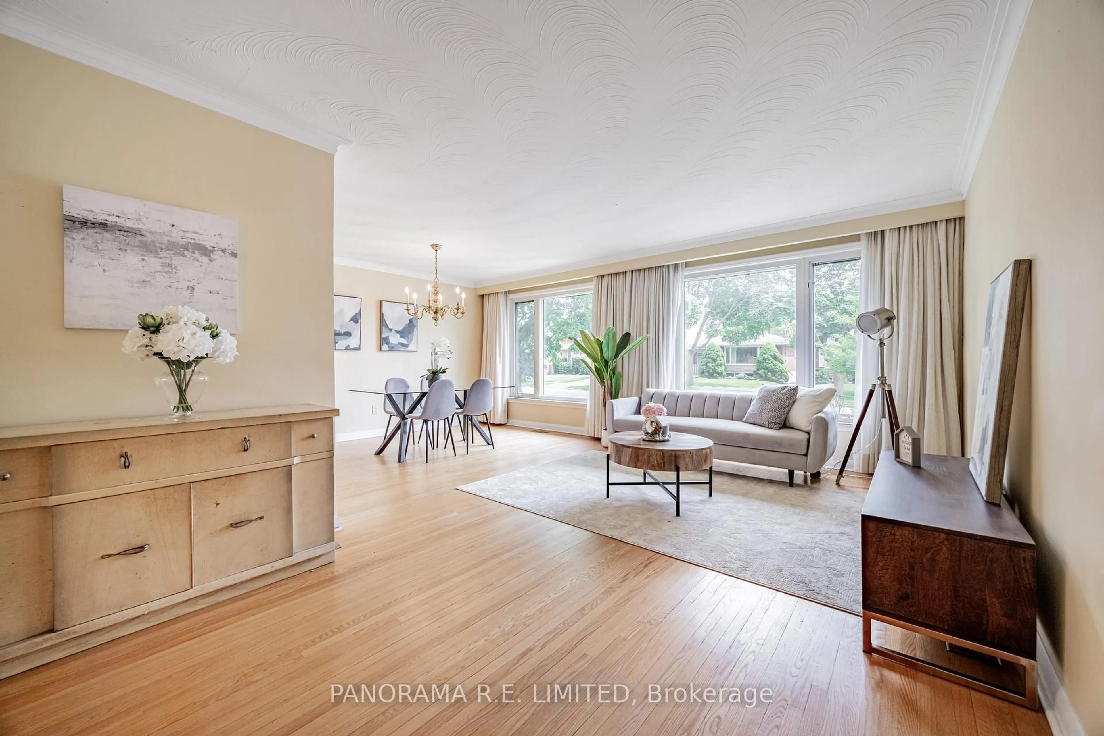 Living room with furniture, wood/laminate floor for 34 Fenley Dr, Toronto Ontario M9R 1M4