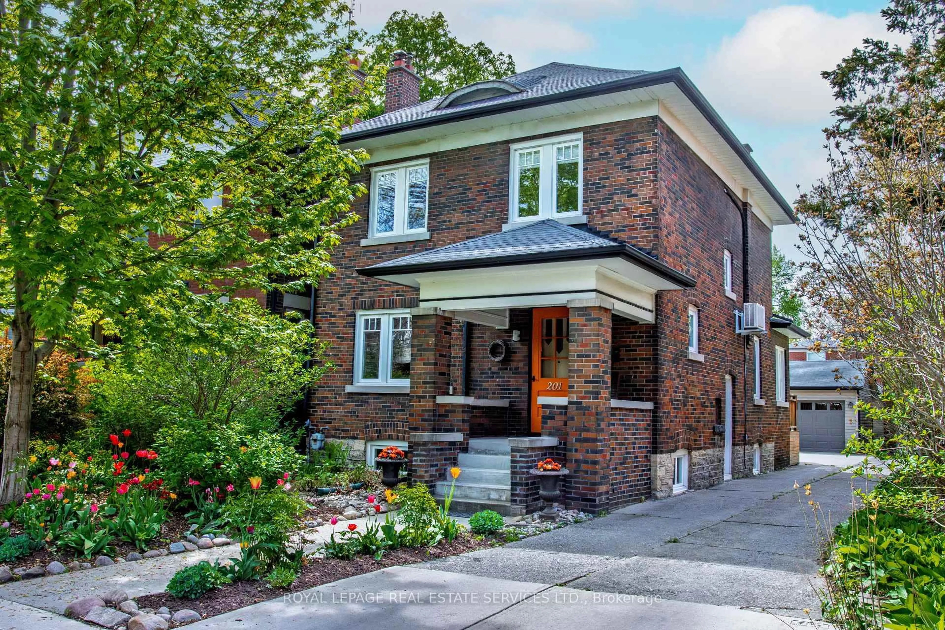 Home with brick exterior material, street for 201 St Johns Rd, Toronto Ontario M6P 1V3