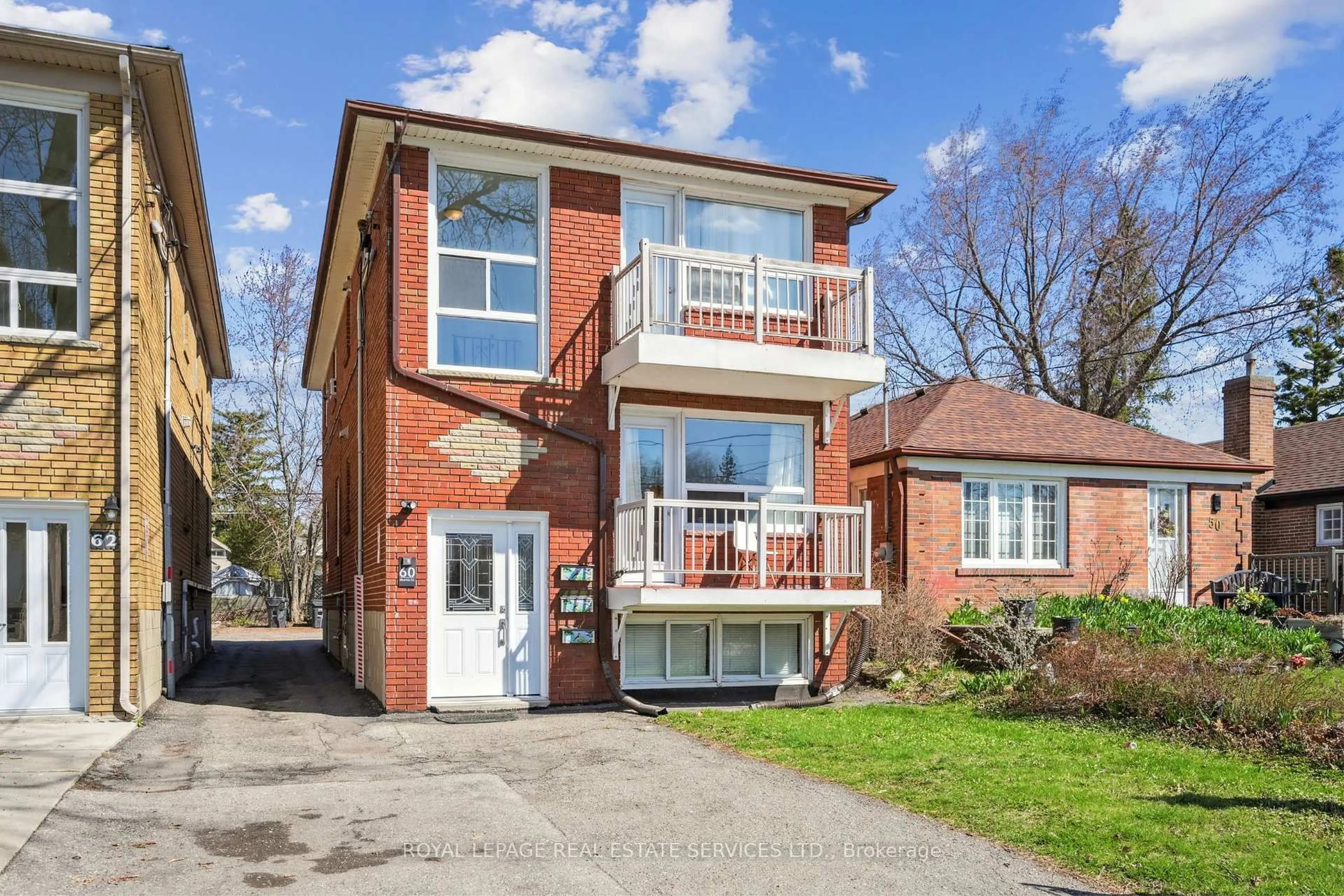 Home with brick exterior material, street for 60 Murrie St, Toronto Ontario M8V 1X7