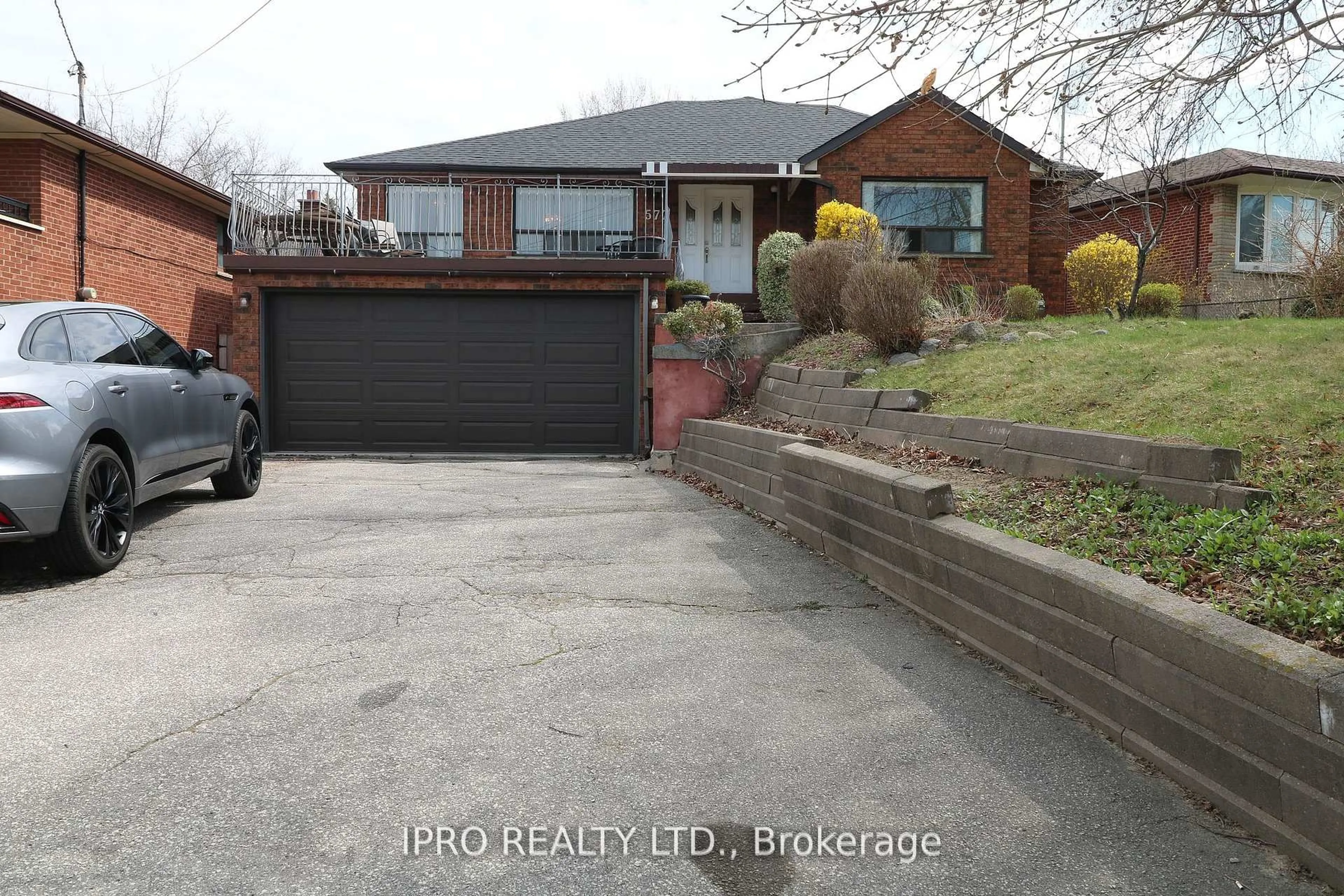 A pic from outside/outdoor area/front of a property/back of a property/a pic from drone, street for 577 Rustic Rd, Toronto Ontario M6L 1Y2