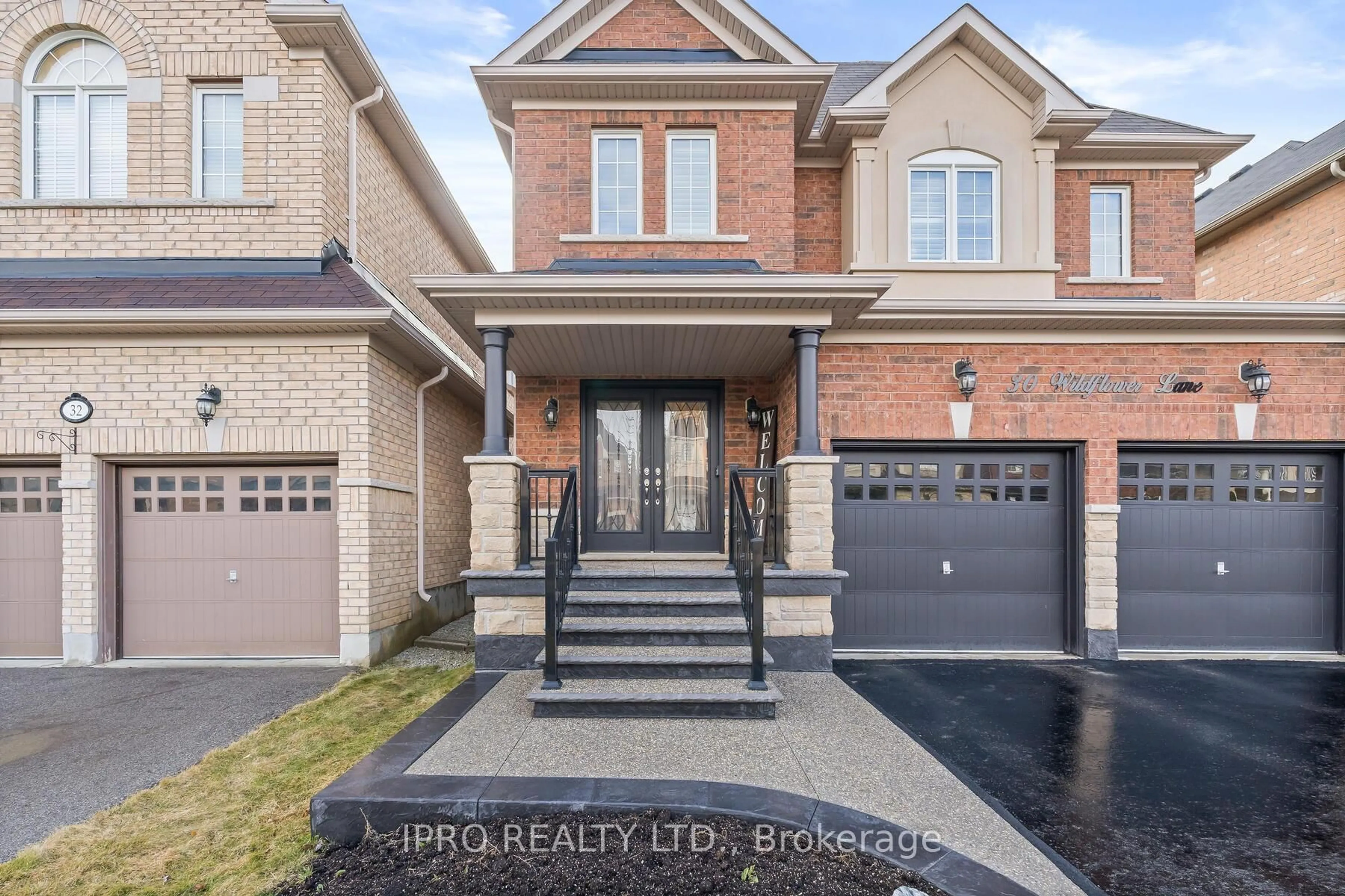 Home with brick exterior material, street for 30 Wildflower Lane, Halton Hills Ontario L7G 0H5