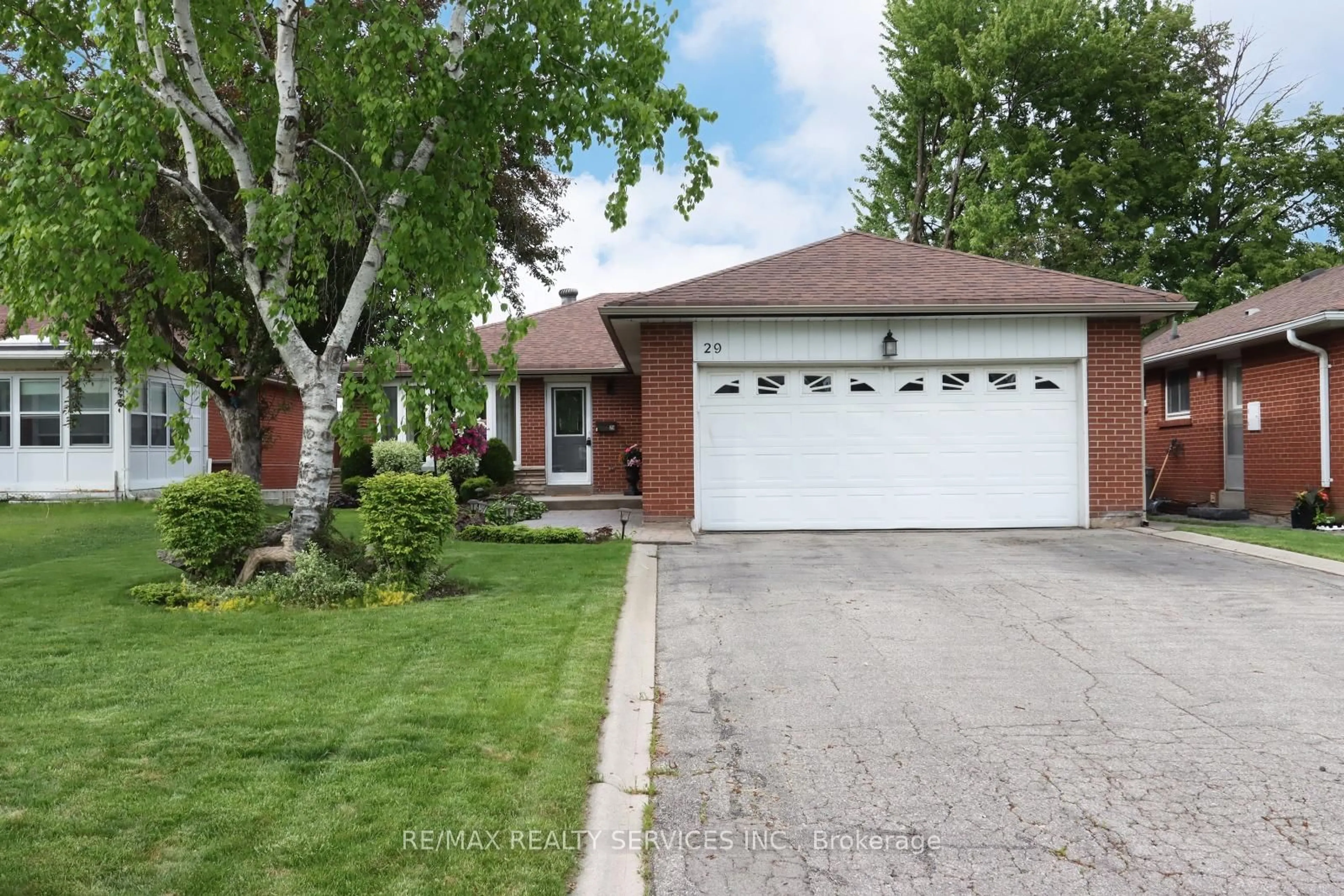 Home with brick exterior material, street for 29 Dorchester Dr, Brampton Ontario L6T 3C8