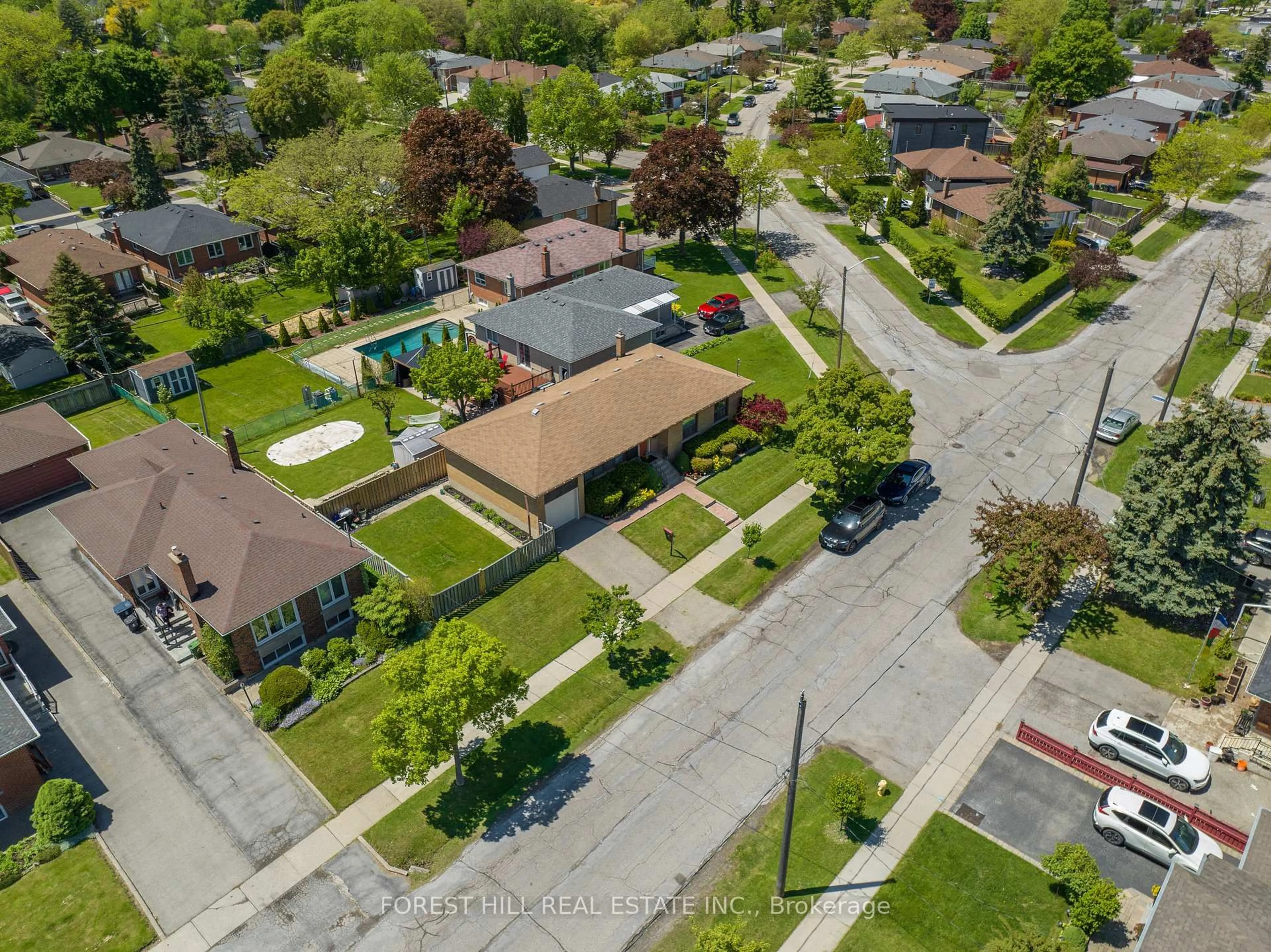 A pic from outside/outdoor area/front of a property/back of a property/a pic from drone, street for 69 Rayside Dr, Toronto Ontario M9C 1S9