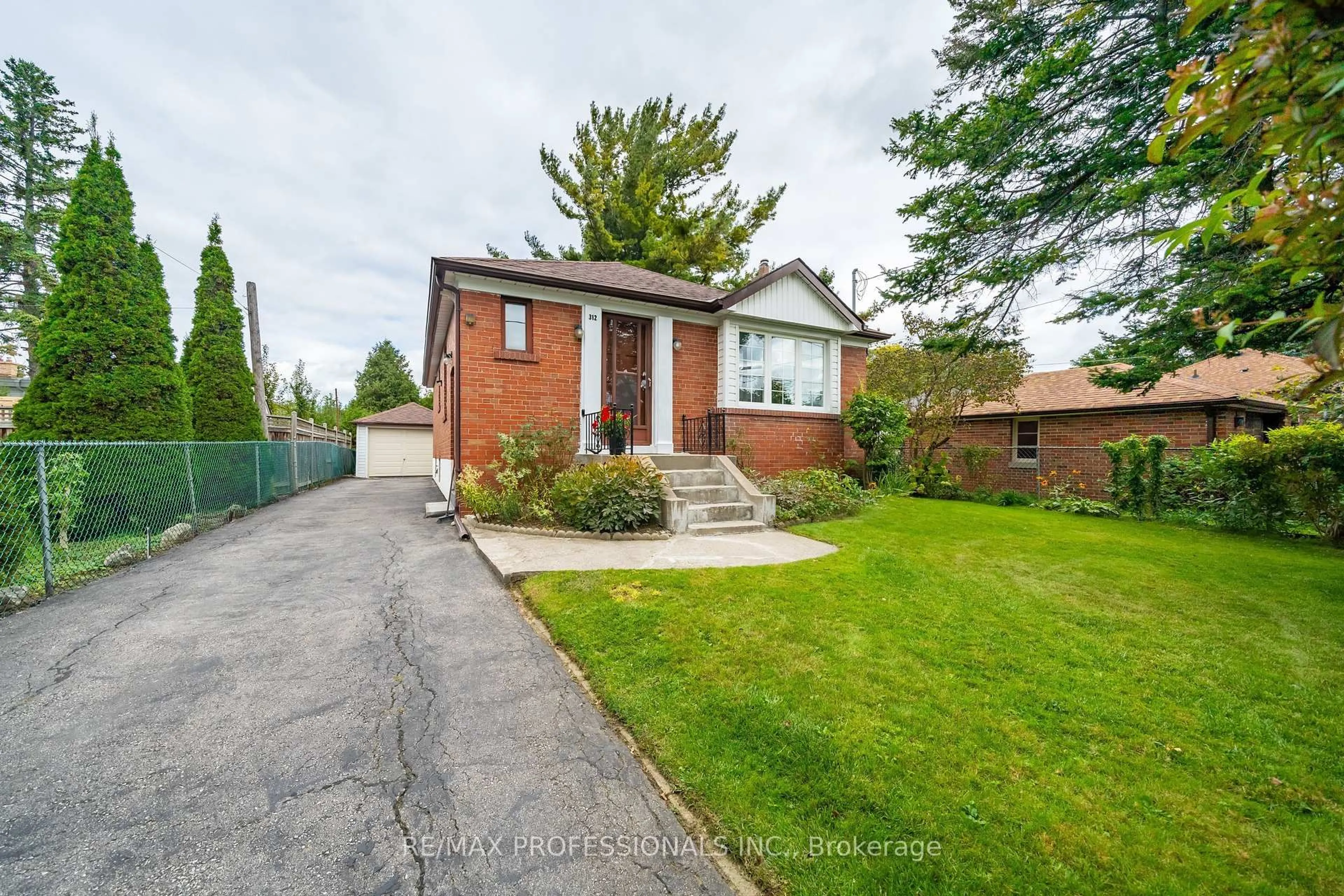Home with brick exterior material, street for 312 Dalesford Rd, Toronto Ontario M8Y 1G7