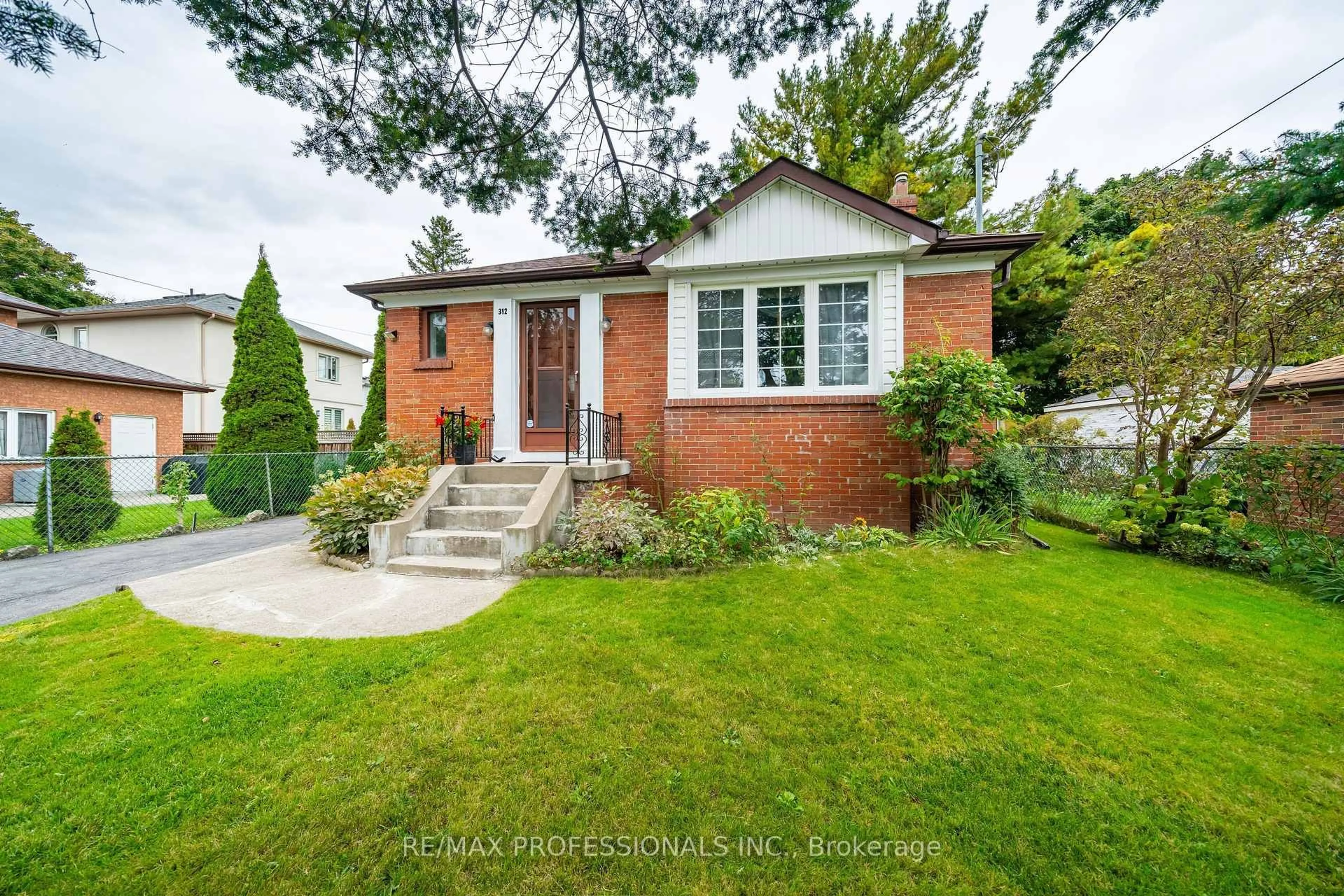 Home with brick exterior material, street for 312 Dalesford Rd, Toronto Ontario M8Y 1G7